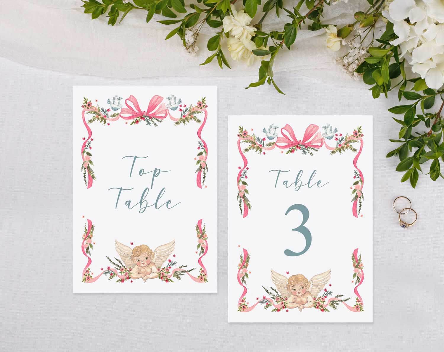 Vintage Wedding Table Numbers featuring floral designs and angel graphics for elegant seating arrangements.