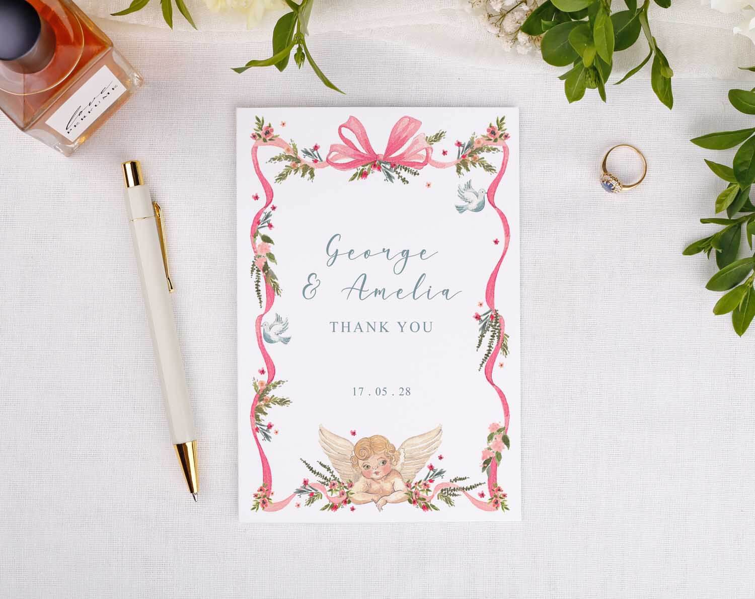 Vintage Wedding Thank You Cards featuring a floral design and a cherub, personalized for George and Amelia.