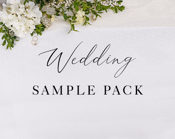 Wedding Sample Pack on a textured background with floral decoration.