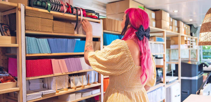 making meadows small business office, showing stationery on shelves, ready to send orders out