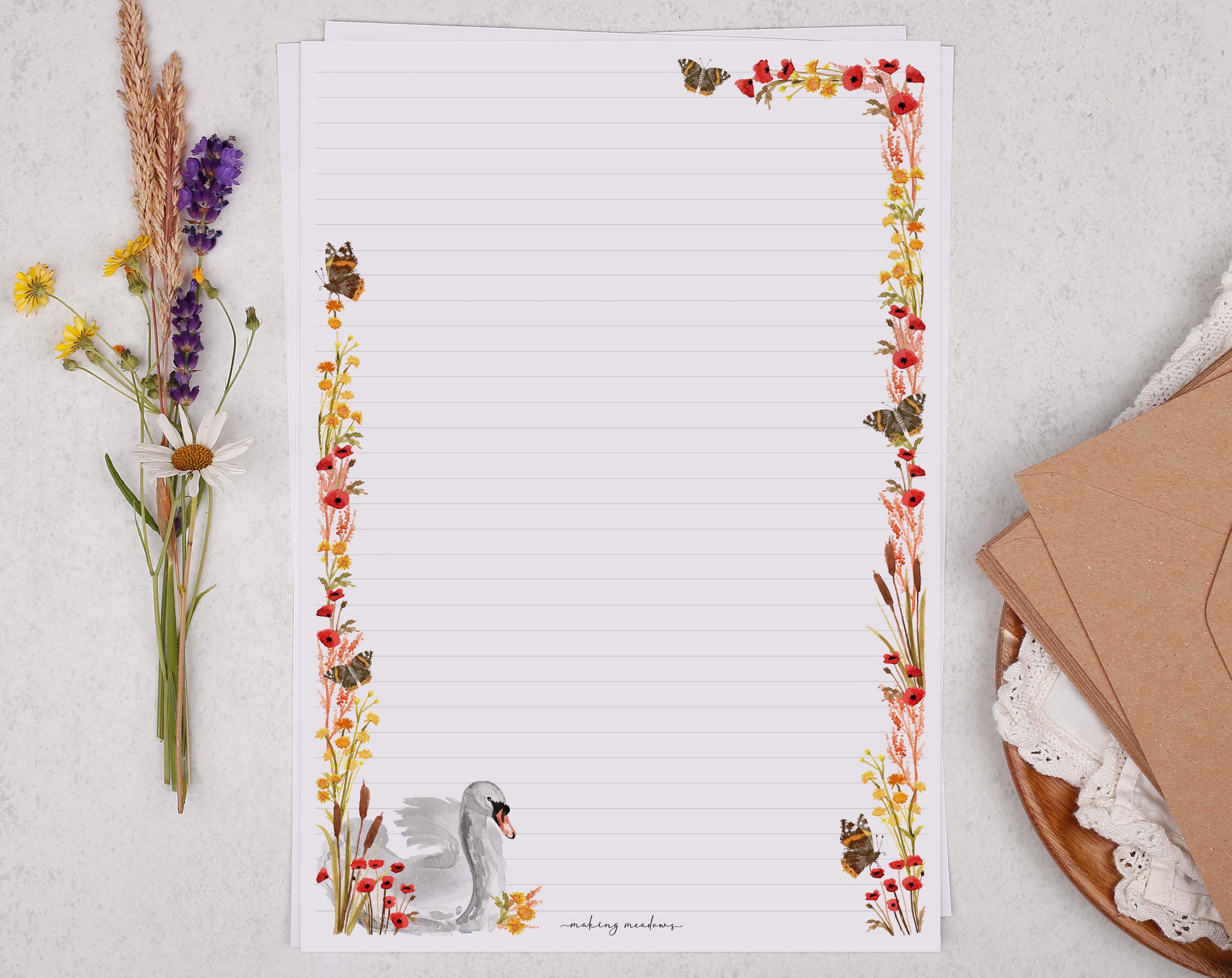 A4 writing paper with a swan and flower border. Stationery designed by Making Meadows