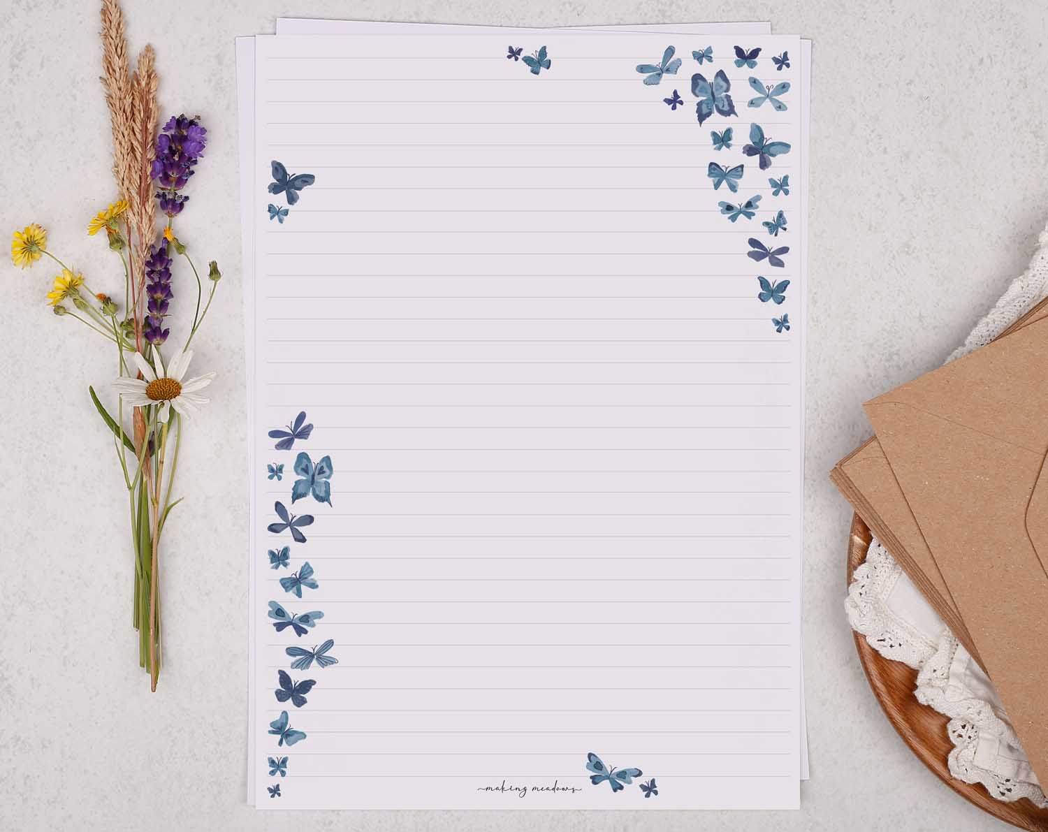 A4 writing paper with cascading butterflies. Stationery designed by Making Meadows