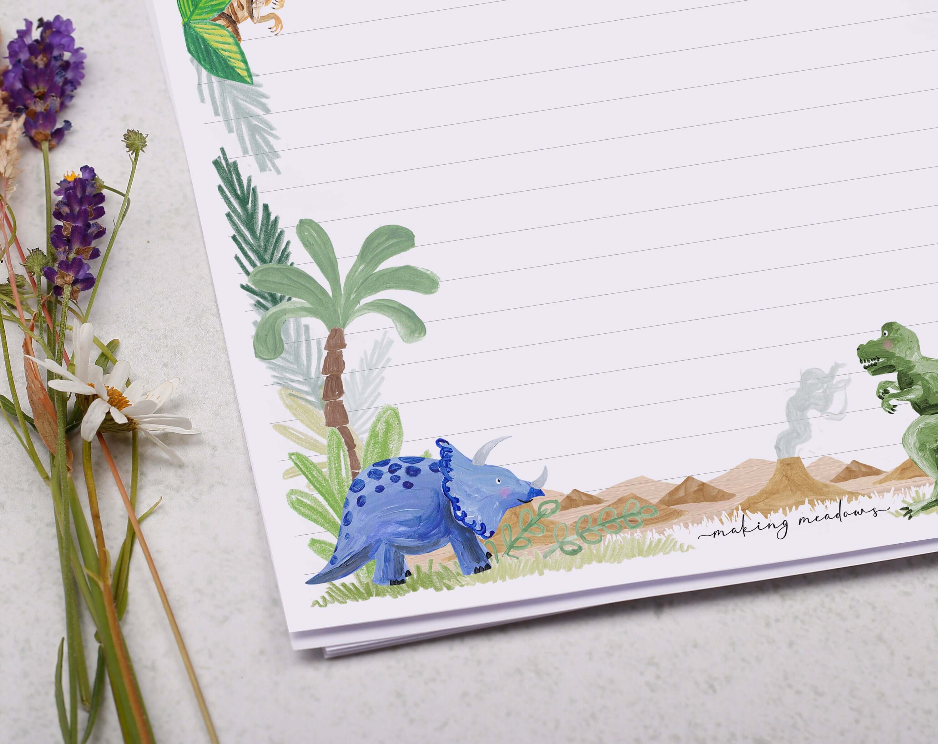 A4 writing paper with dinosaur jungle. Stationery designed by Making Meadows