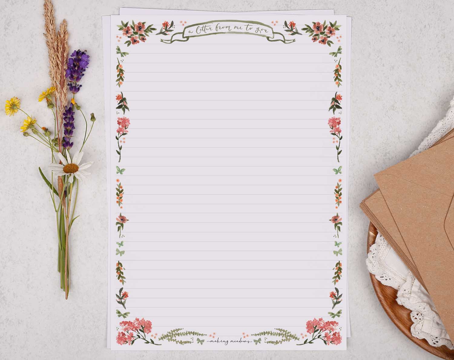 A4 writing paper with pink floral border. Stationery designed by Making Meadows