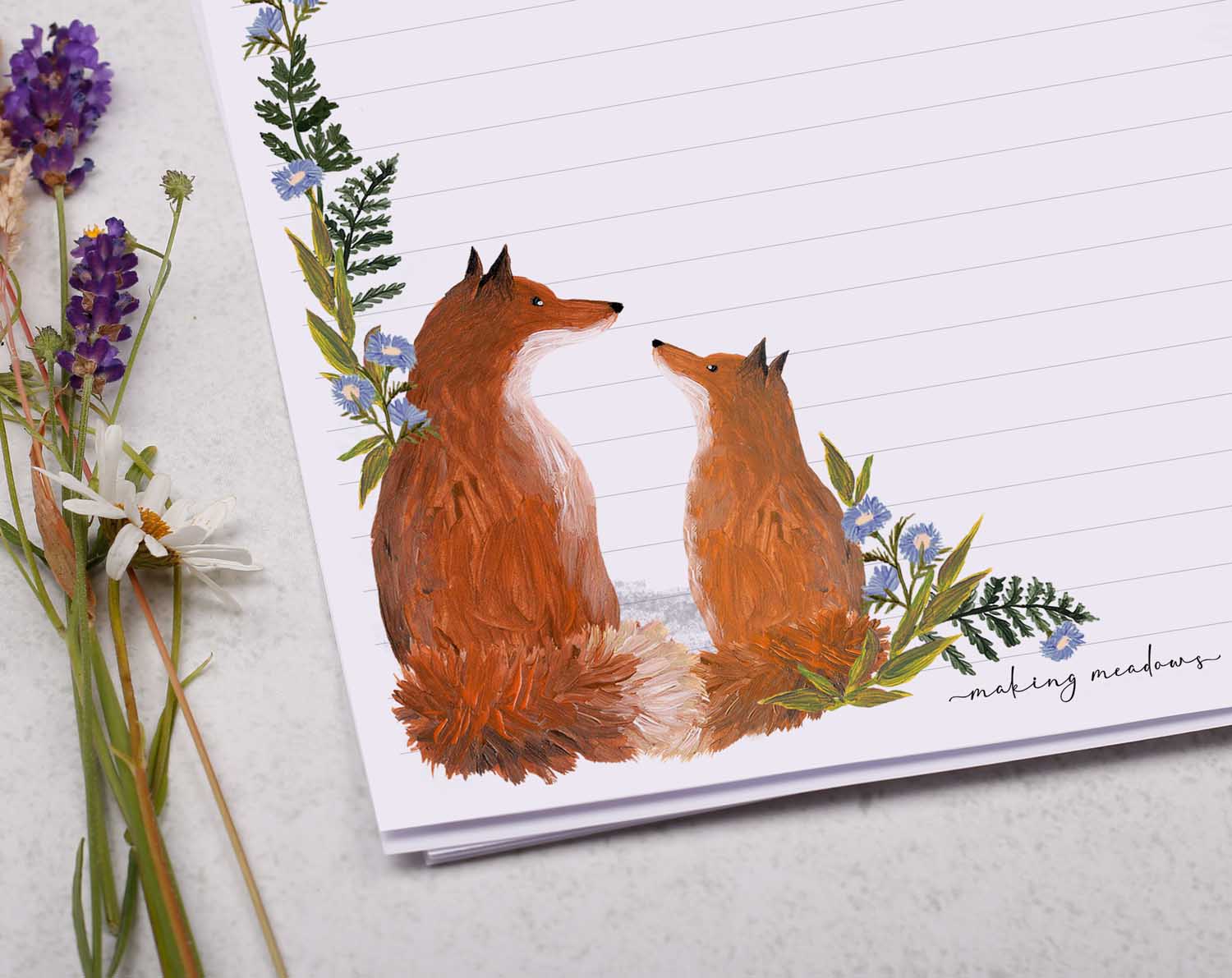 A4 writing paper with red fox and blue floral border. Stationery designed by Making Meadows