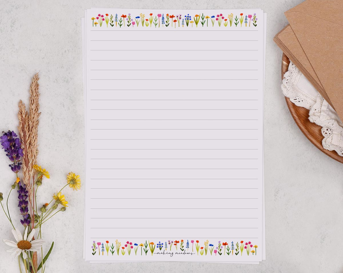 A5 writing paper with cute ditsy flower border. Stationery designed by Making Meadows