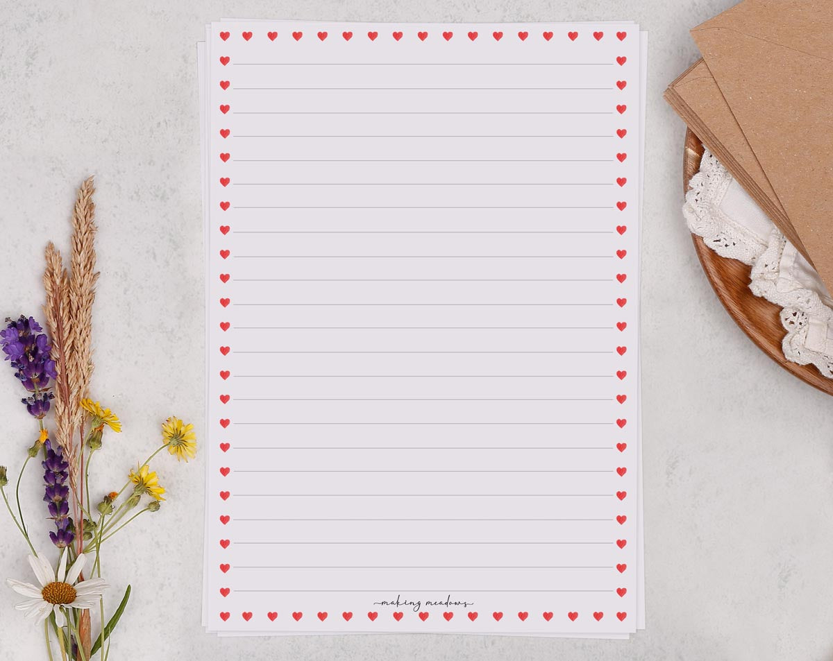 A5 writing paper with ditsy heart border. Stationery designed by Making Meadows