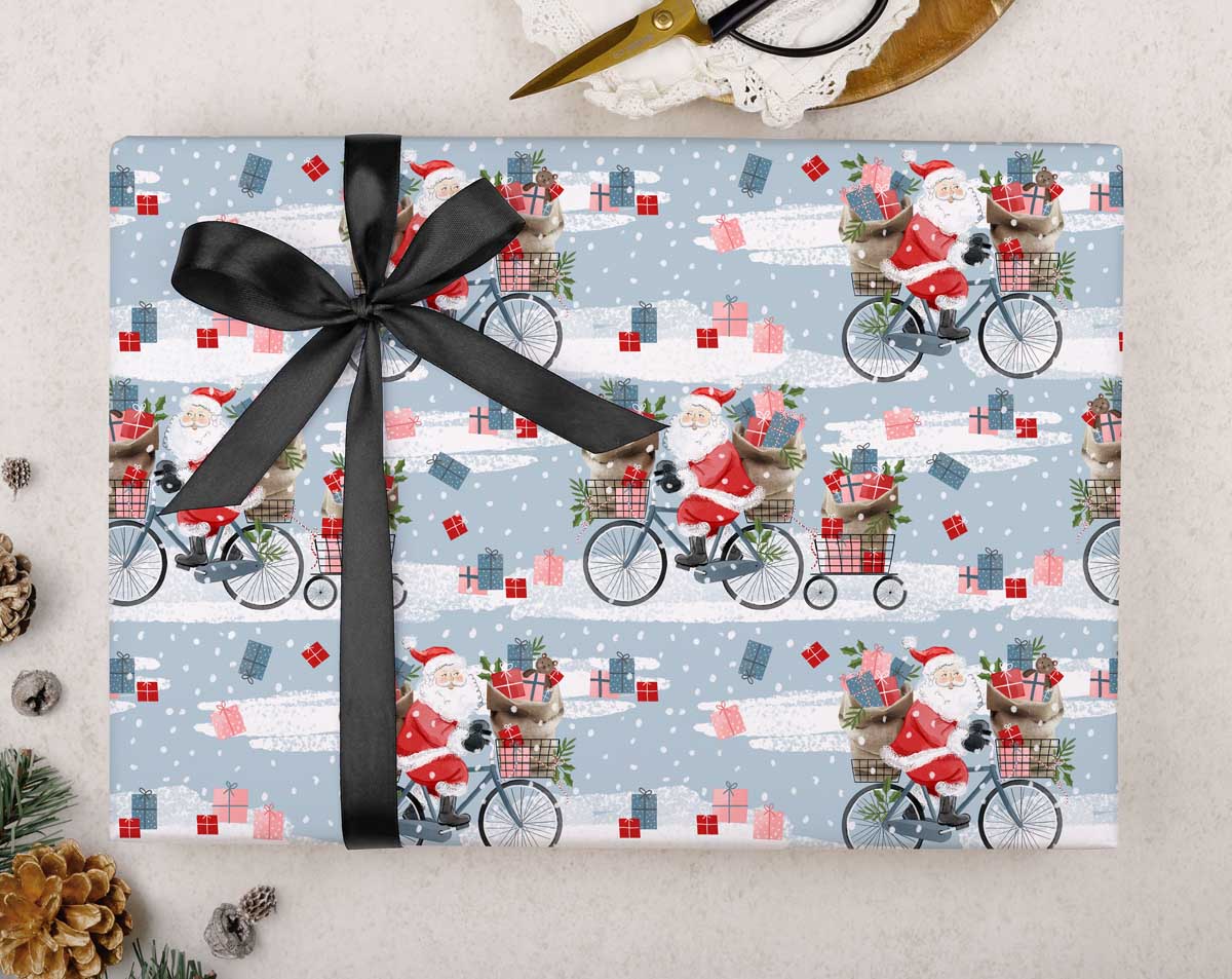 Father Christmas On Bike Wrapping Paper. Wrapping Paper designed by Making Meadows