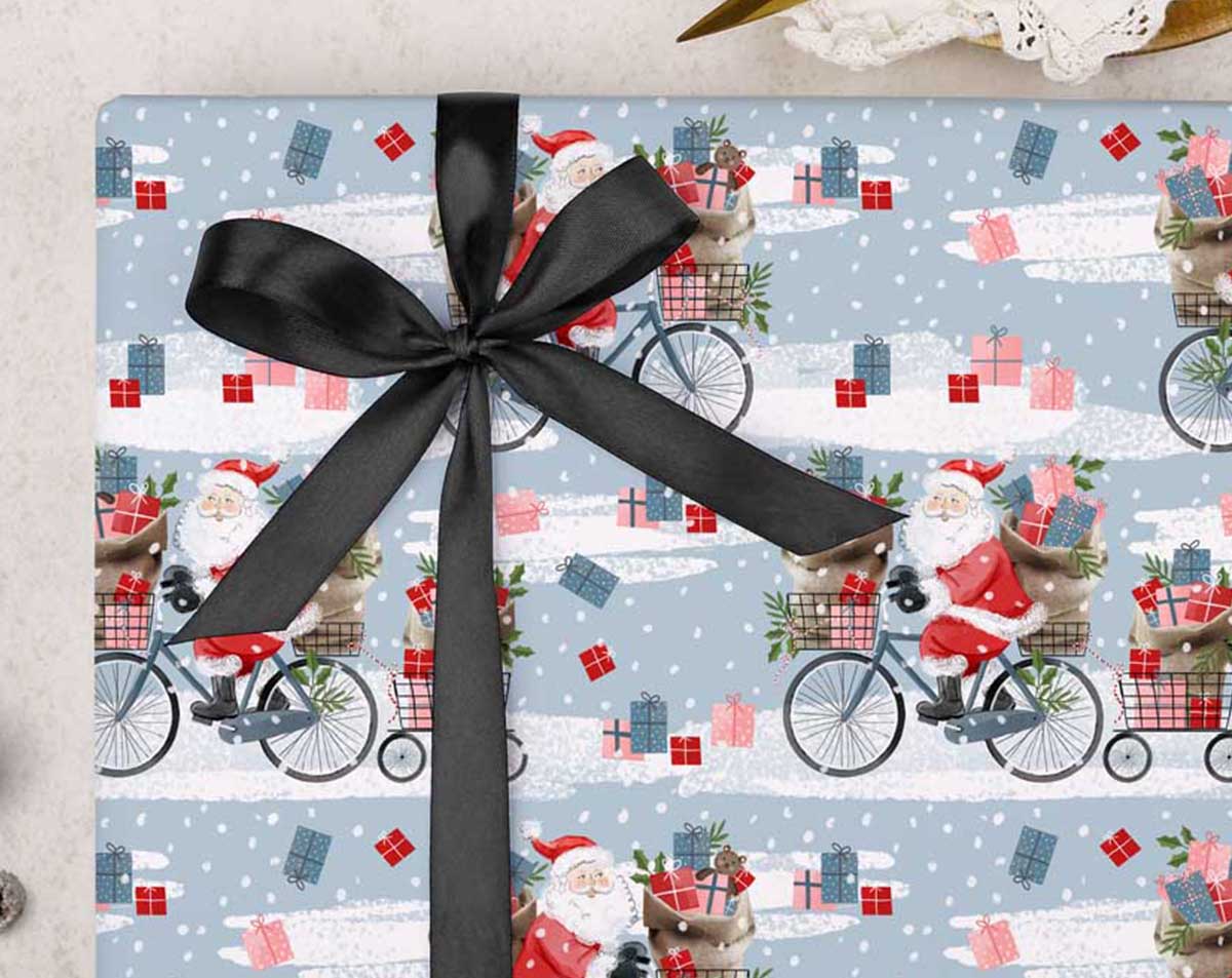 Father Christmas On Bike Wrapping Paper. Wrapping Paper designed by Making Meadows