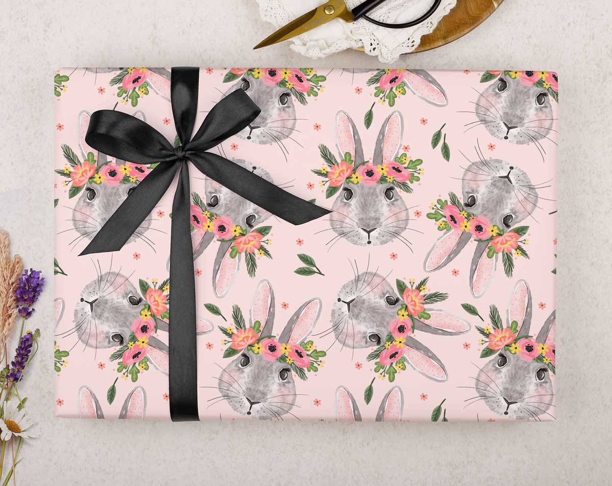 Pink rabbits with flowers wrapping paper. Wrapping Paper designed by Making Meadows