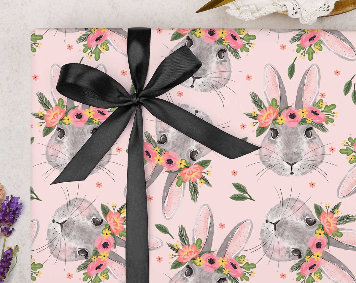 Pink rabbits with flowers wrapping paper. Wrapping Paper designed by Making Meadows