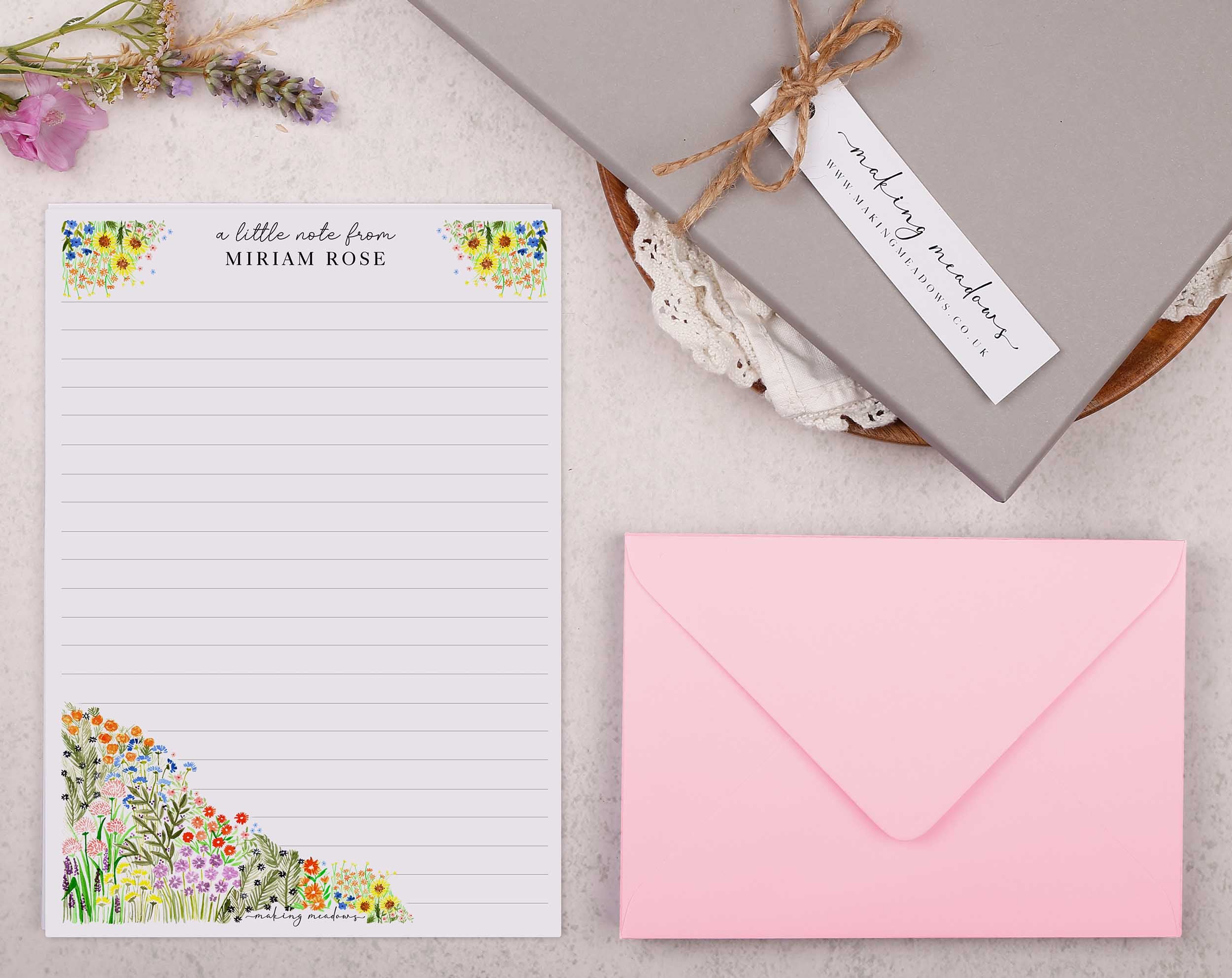 Personalised Writing Paper with a floral design, pink envelope, and decorative elements for correspondence.