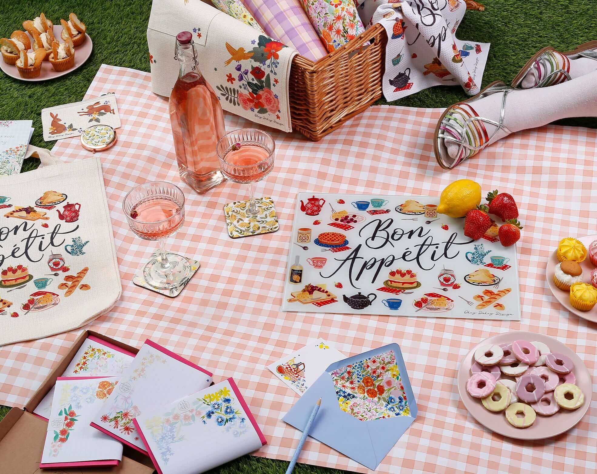Summer Stationery items arranged for a picnic, featuring colorful designs and an inviting atmosphere.