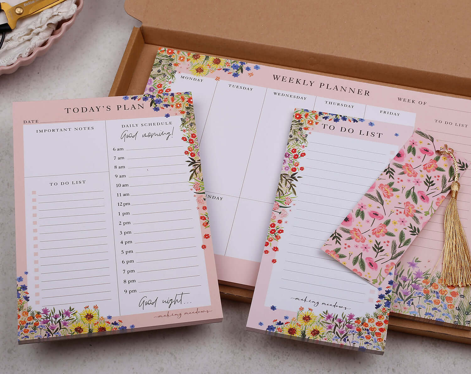 Unique Mothers Day Gift Ideas featuring floral stationery, planners, and to-do lists for stationery lovers.