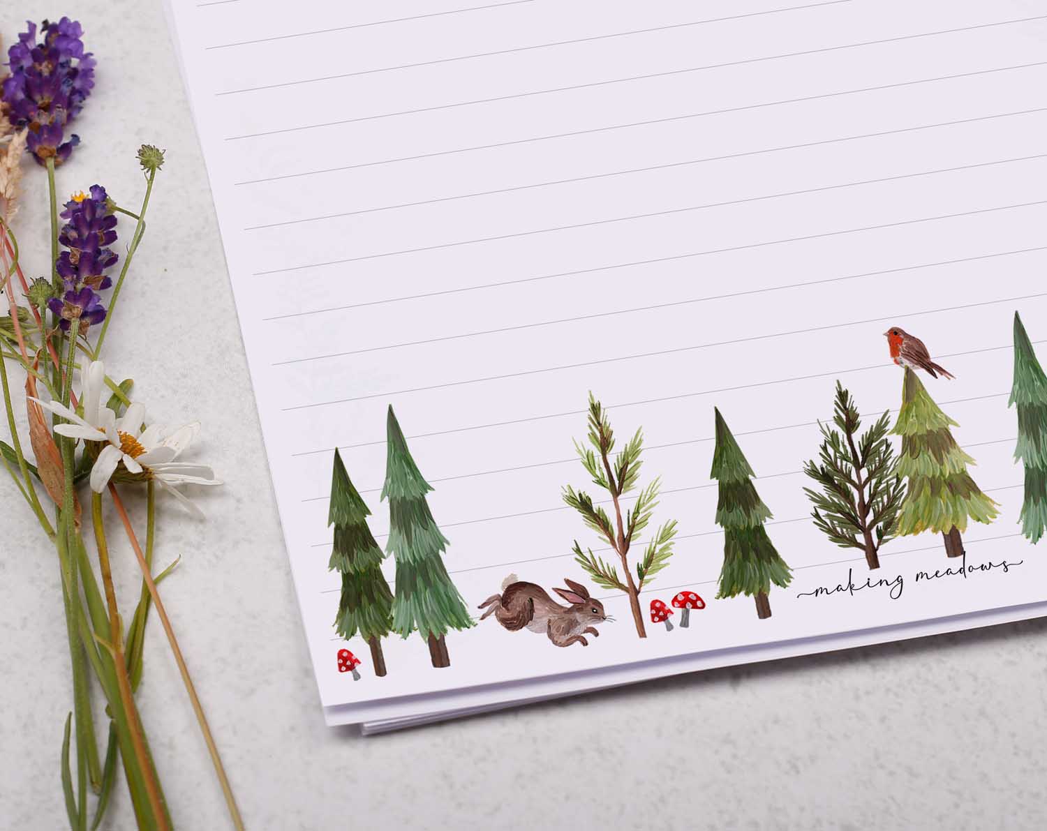 A4 letter writing paper sheets with a woodland animal and pine trees border design.