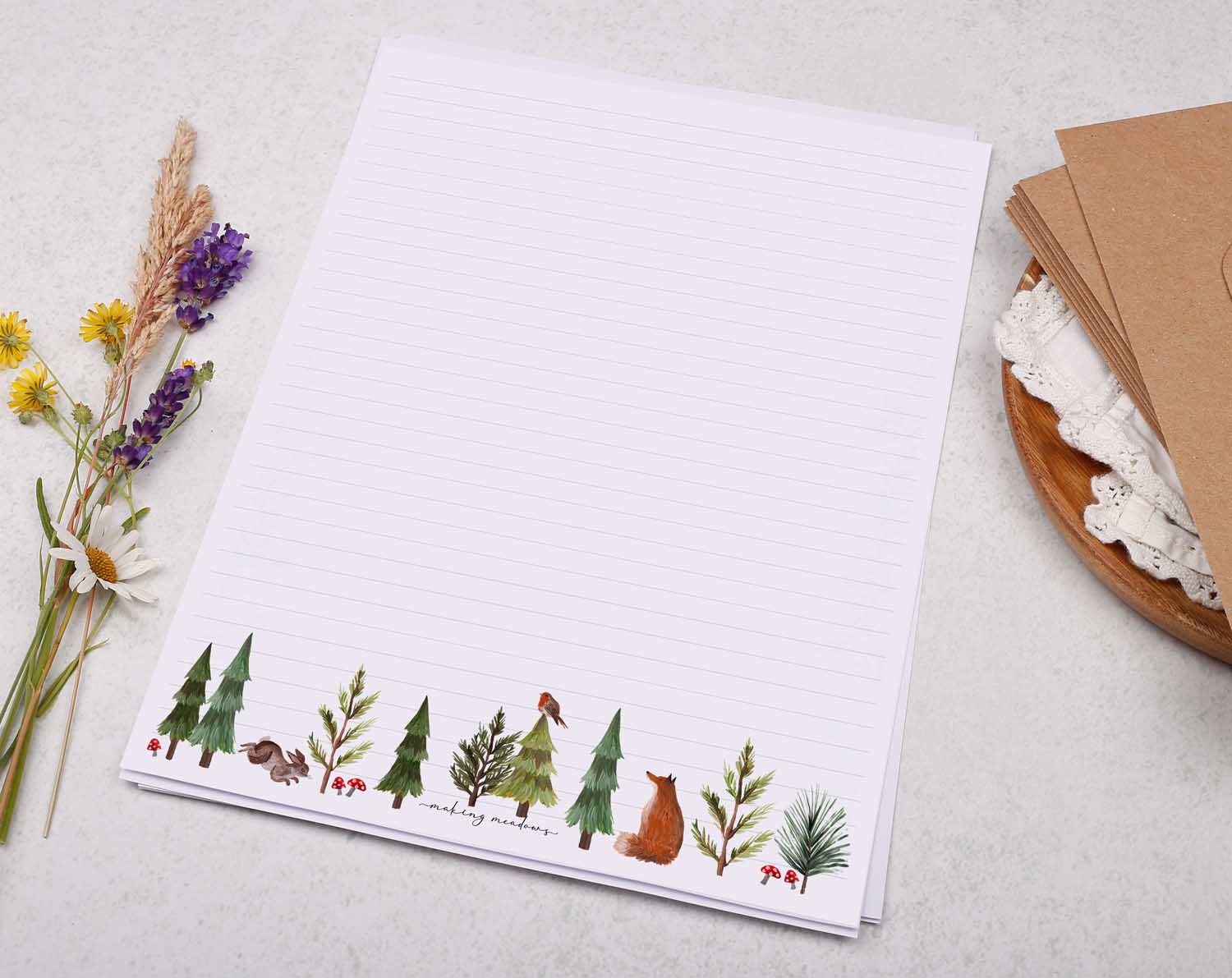 A4 letter writing paper sheets with a woodland animal and pine trees border design.