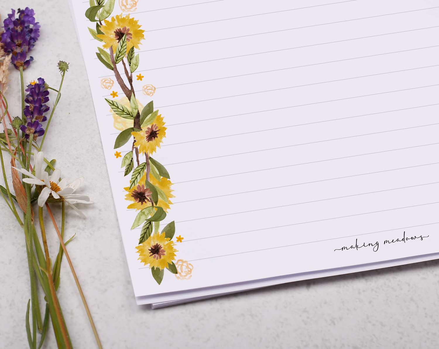 A4 letter writing paper sheets with a yellow sunflower border around the letter paper in a delicate flower pattern. 