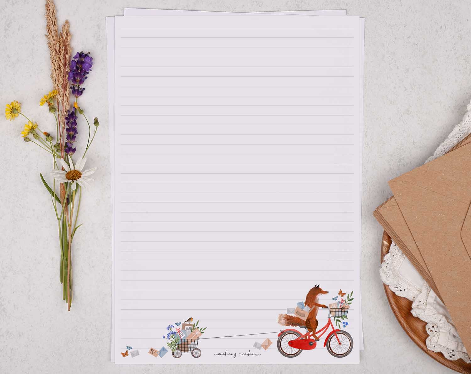A4 letter writing paper sheets with an illustration of a fox on a bike.