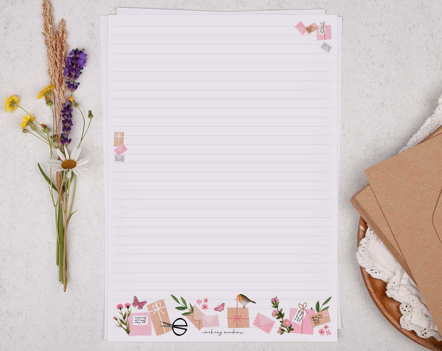 A4 letter writing paper sheets with a pink floral post border around the letter paper in a delicate flower pattern. 