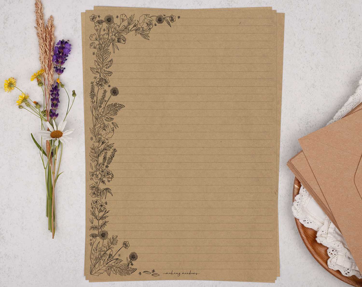 A4 Kraft letter writing paper sheets with a linear hand drawn floral edge. 