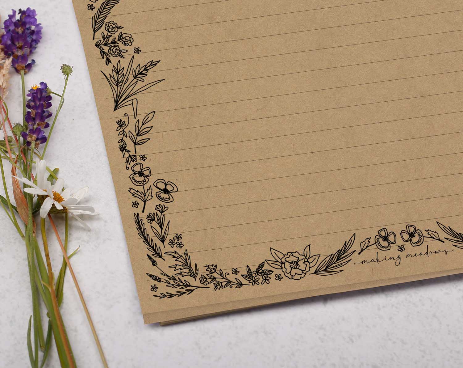 A4 Kraft letter writing paper sheets with a linear hand drawn floral edge.