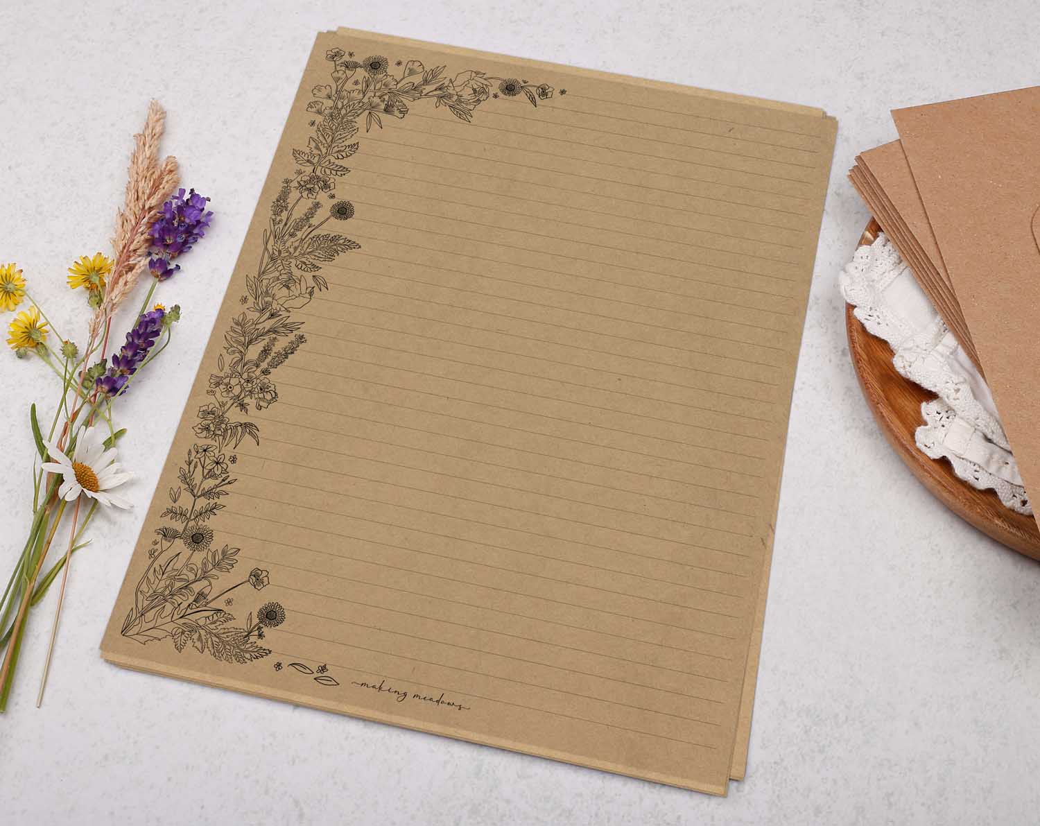 A4 Kraft letter writing paper sheets with a linear hand drawn floral edge. 