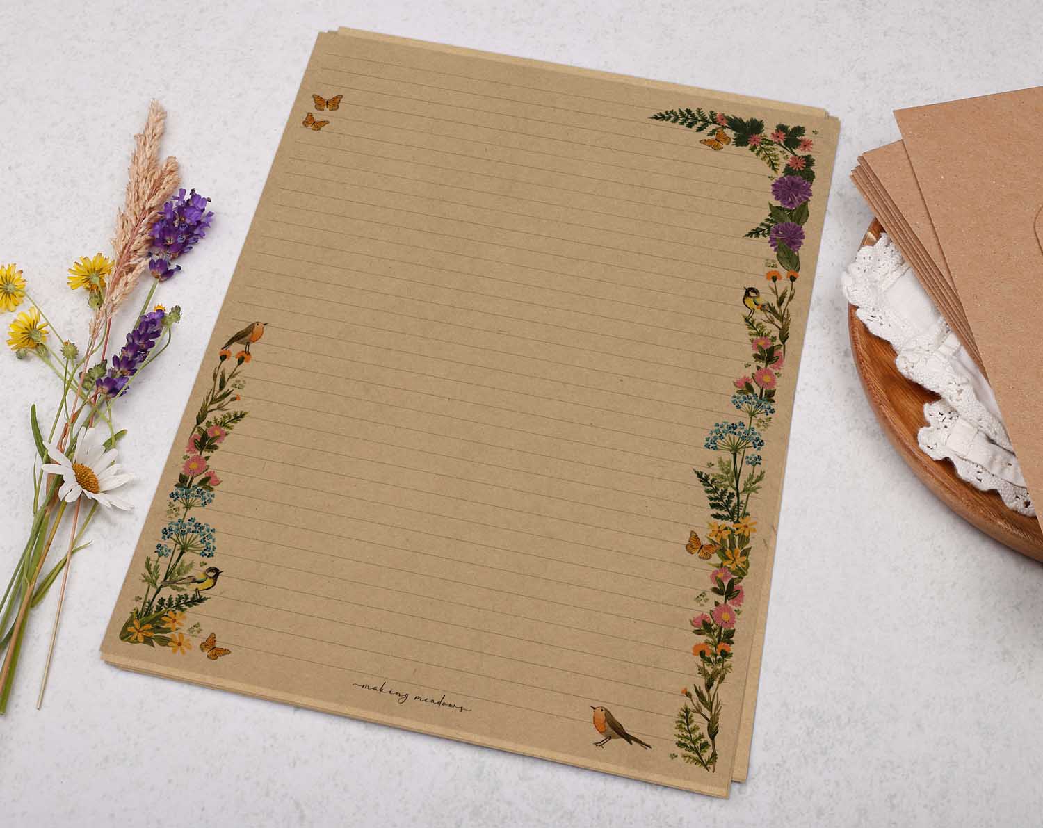 A4 Kraft letter writing paper sheets with a beautiful floral watercolour border design cascading around the edge.