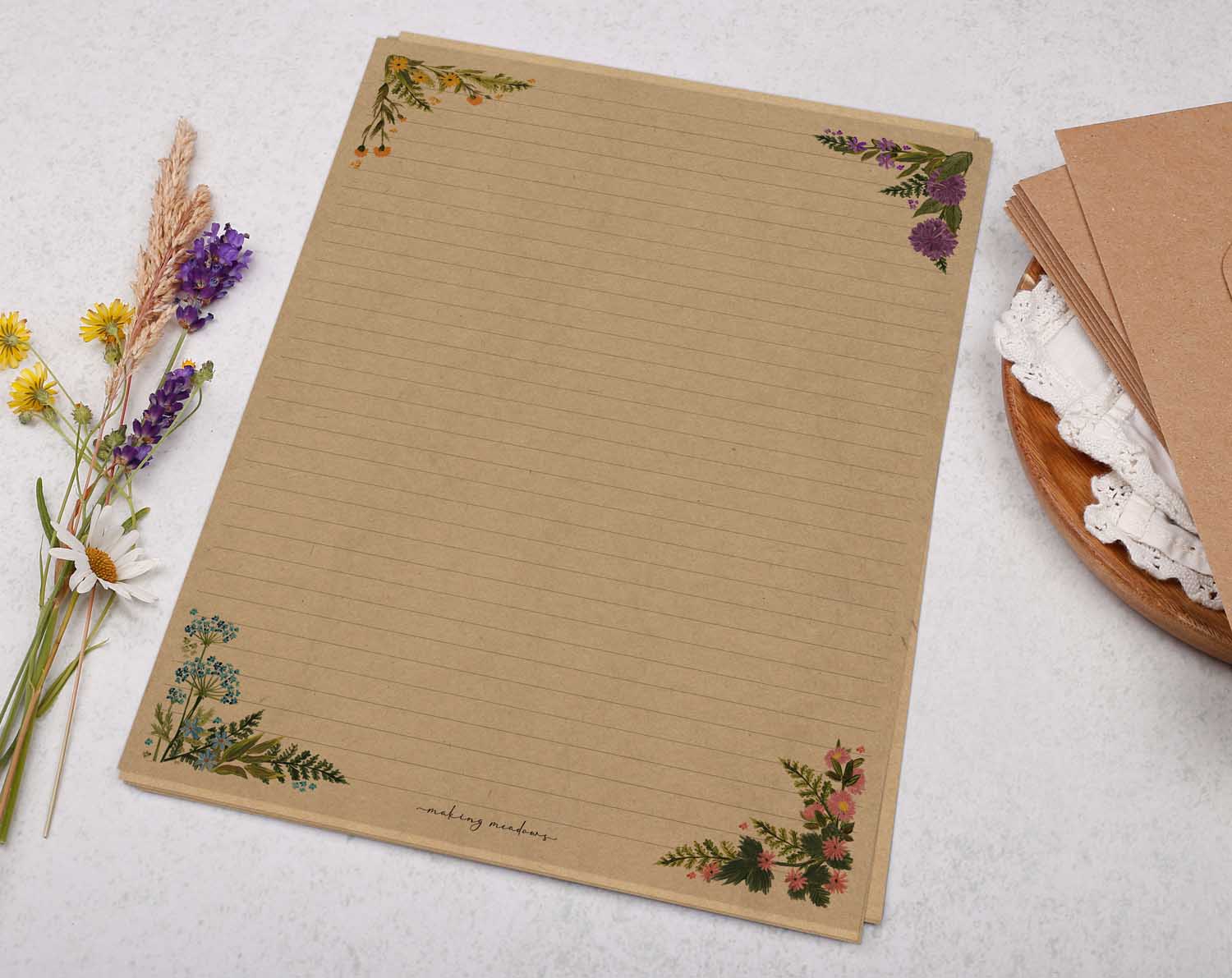 A4 kraft writing paper with corner flowers. Stationery designed by Making Meadows