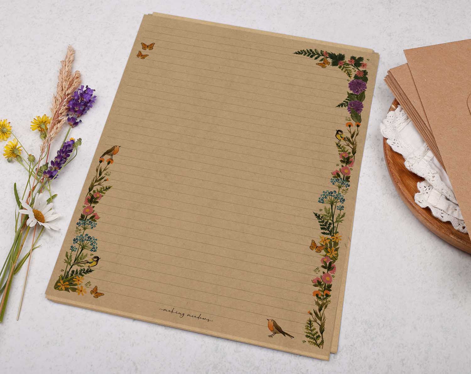 A4 kraft writing paper with meadow flower border. Stationery designed by Making Meadows