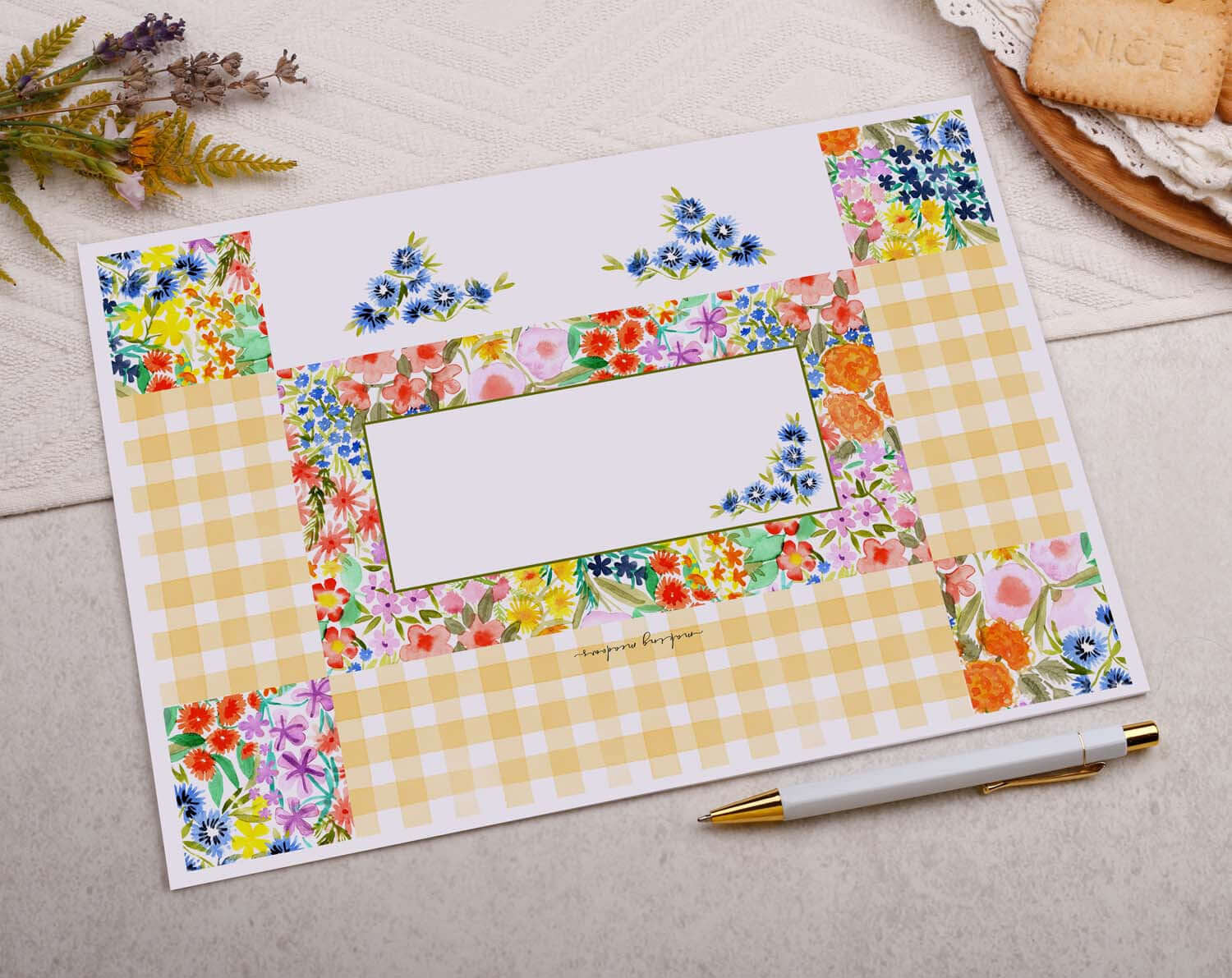 A4 origami writing paper with vibrant watercolour flowers and a checkered pattern, perfect for letters and notes.