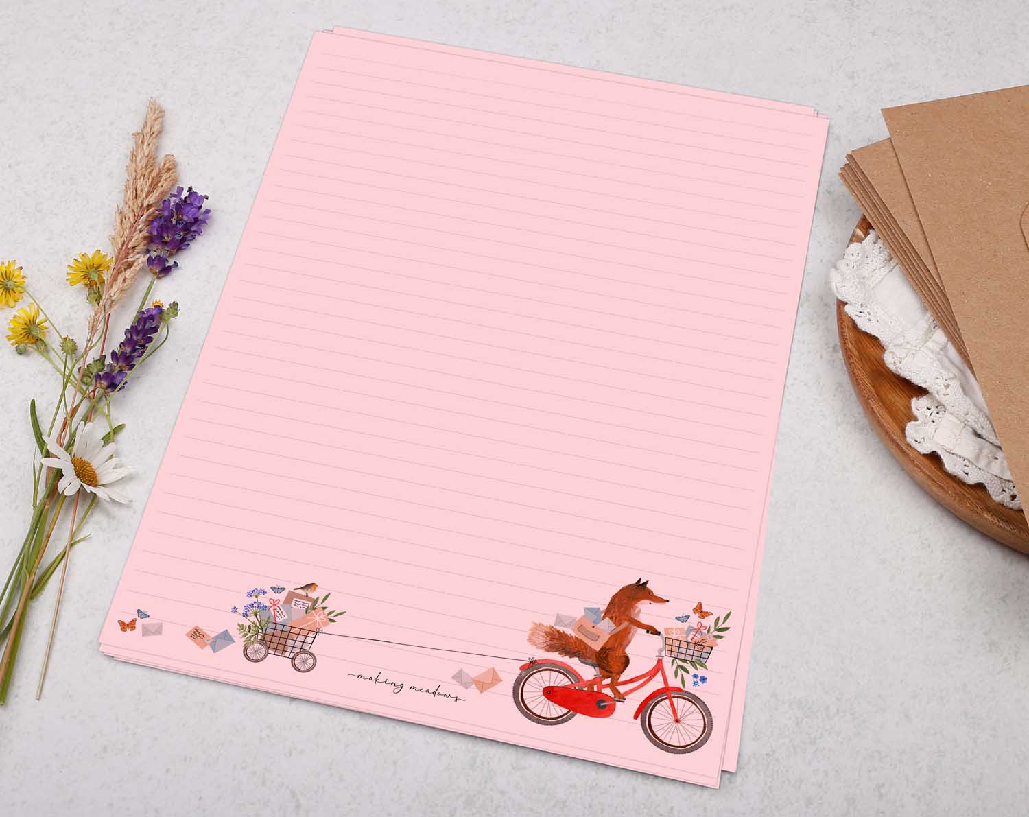 A4 pink writing paper with fox on bicycle. Stationery designed by Making Meadows
