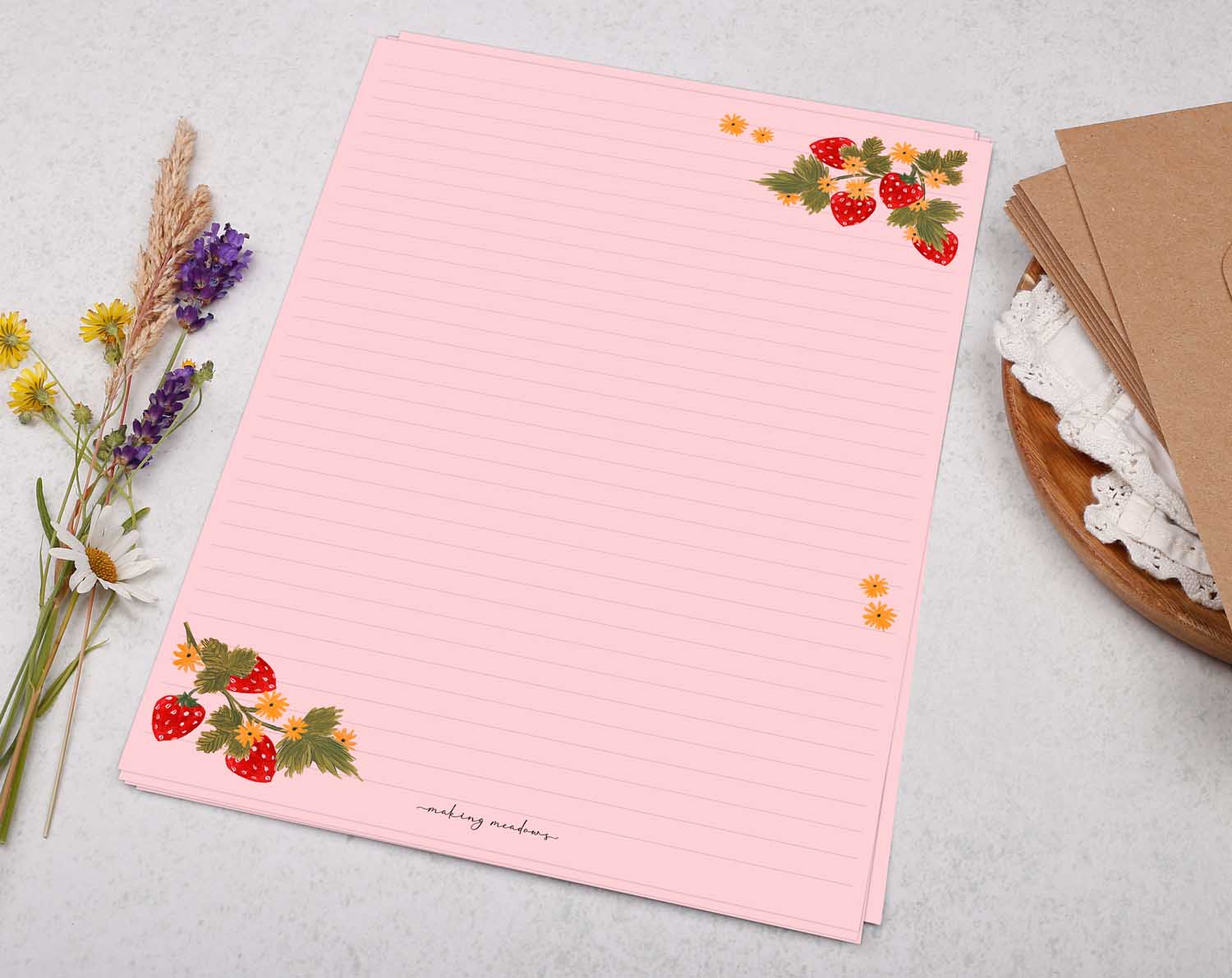 A4 pink writing paper with strawberry blossom. Stationery designed by Making Meadows