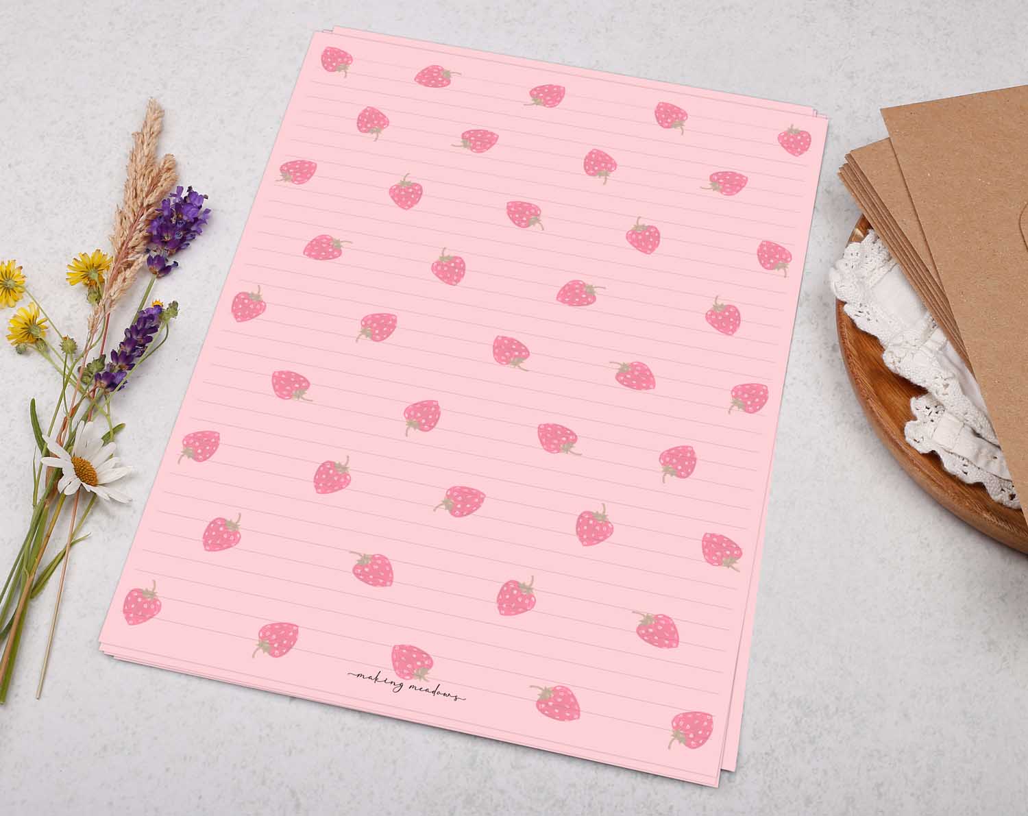 A4 pink writing paper with strawberry pattern. Stationery designed by Making Meadows