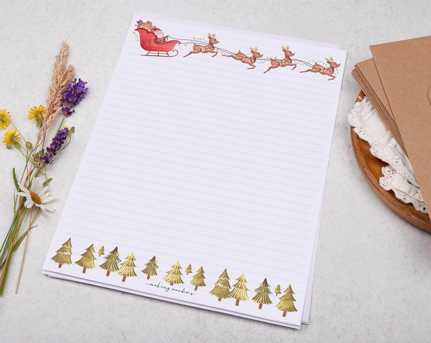 A4 writing paper with Christmas Santa on sleigh. Stationery designed by Making Meadows