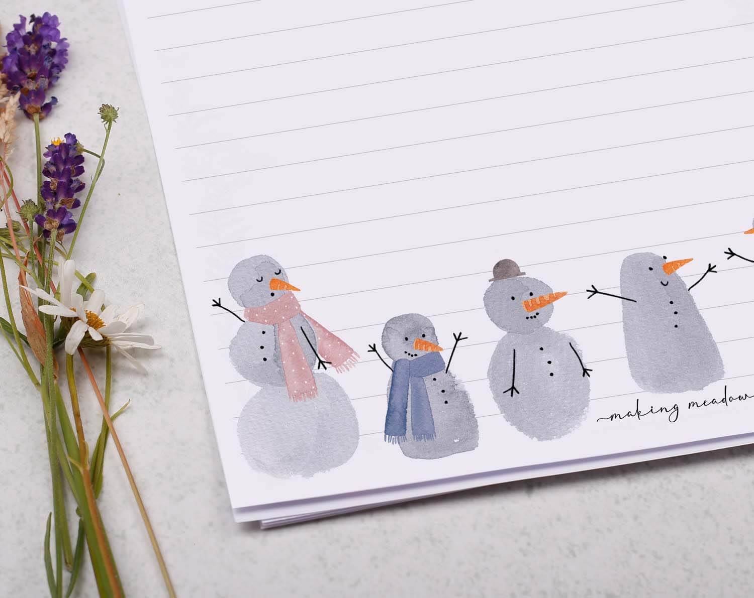 A4 writing paper with Christmas Snowman featuring playful hand-painted snowmen and a winter cat design.