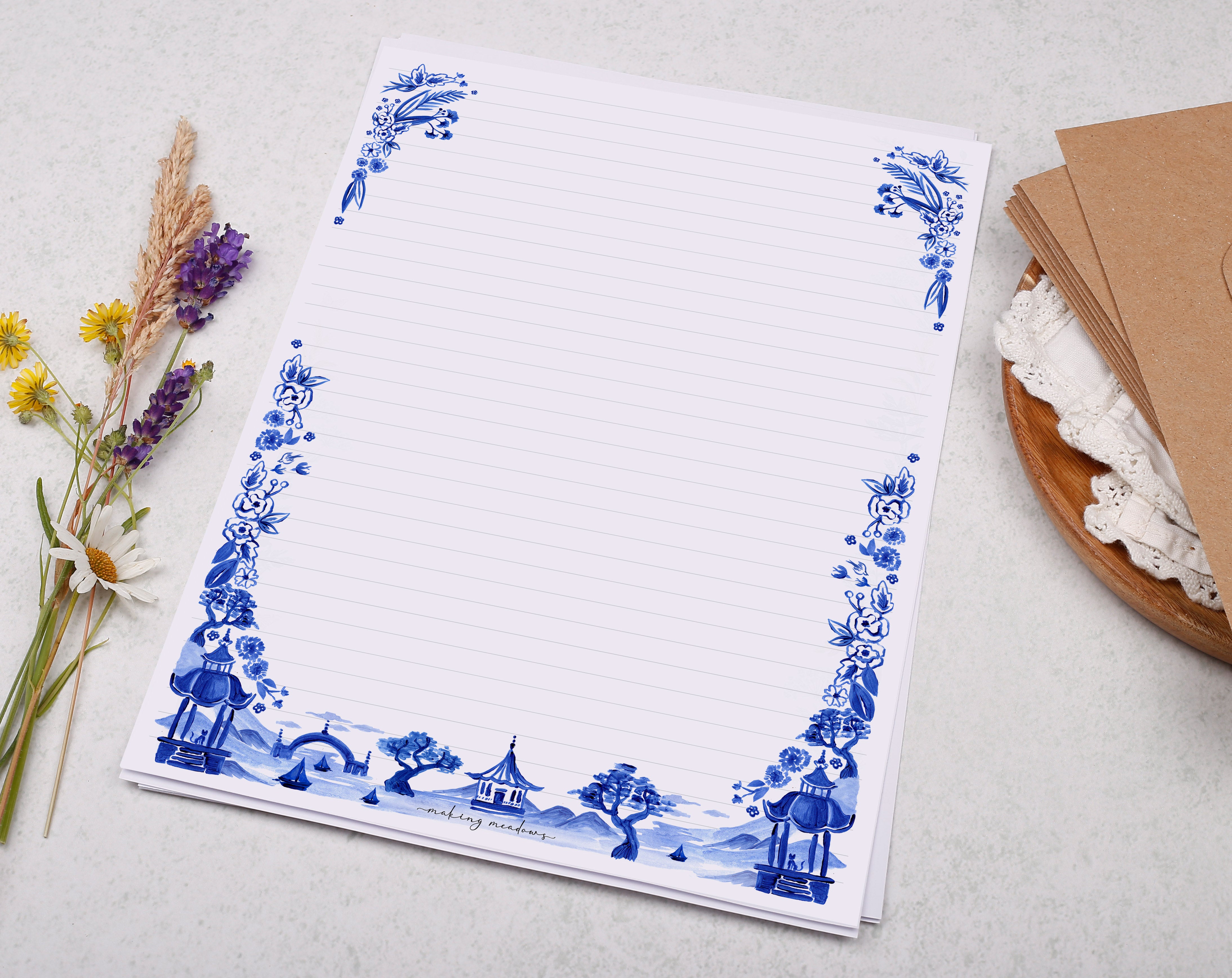 A4 writing paper with a blue Japanese landscape. Stationery designed by Making Meadows