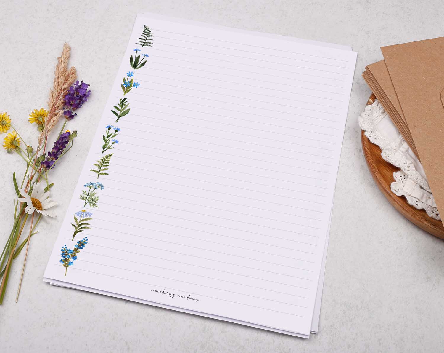 A4 writing paper with blue flower border. Stationery designed by Making Meadows