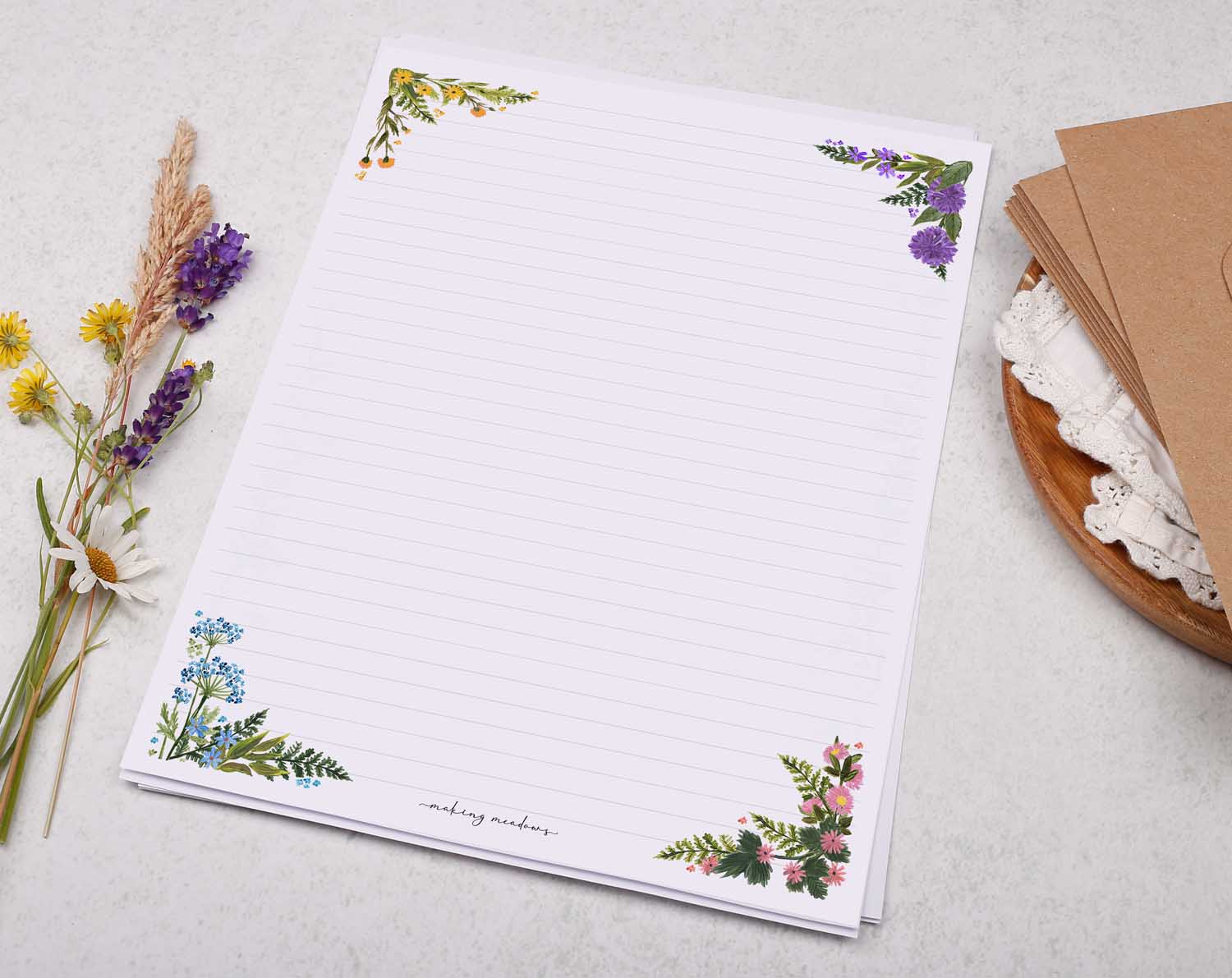 A4 writing paper with floral corners. Stationery designed by Making Meadows