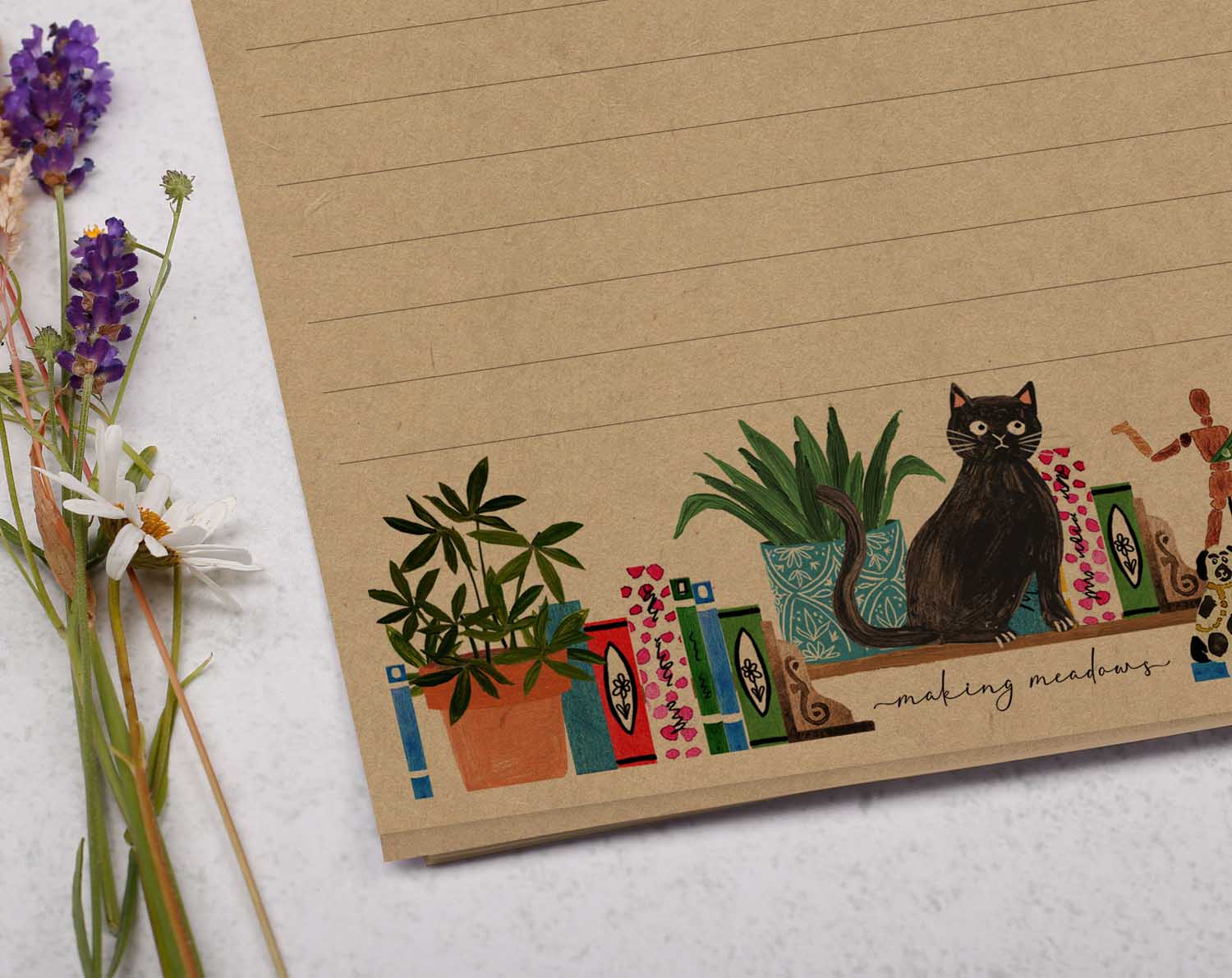 A5 Kraft letter writing paper sheets with books on bookshelf and a cat design.