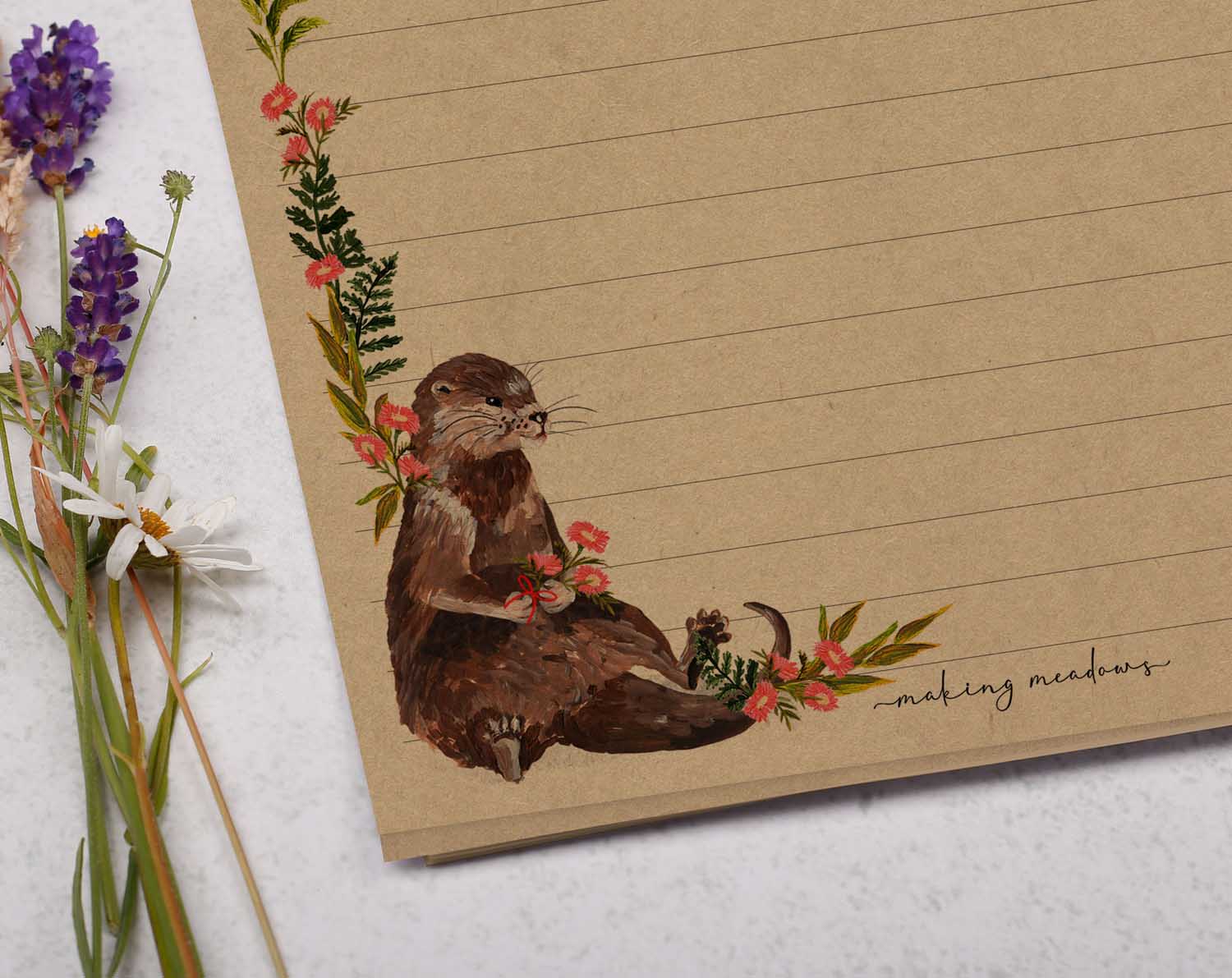 A5 Kraft letter writing paper sheets with otter and pink flowers design. 