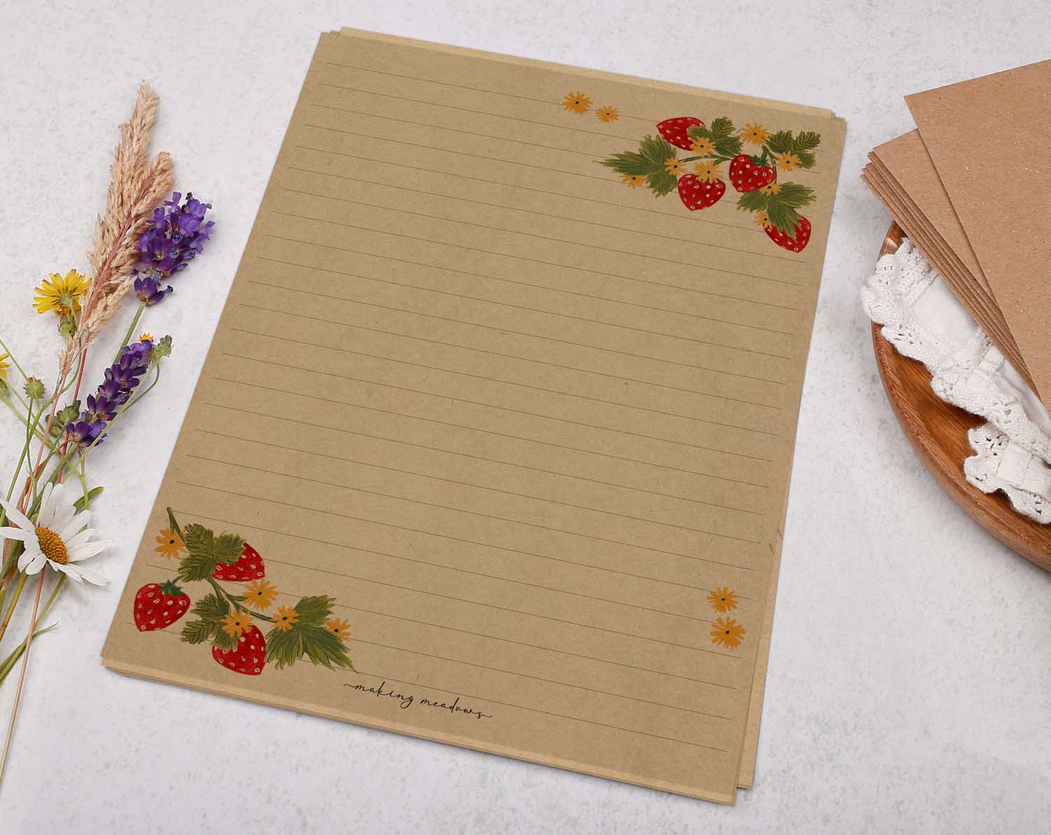 A5 Kraft letter writing paper sheets with a cute strawberry blossom design.