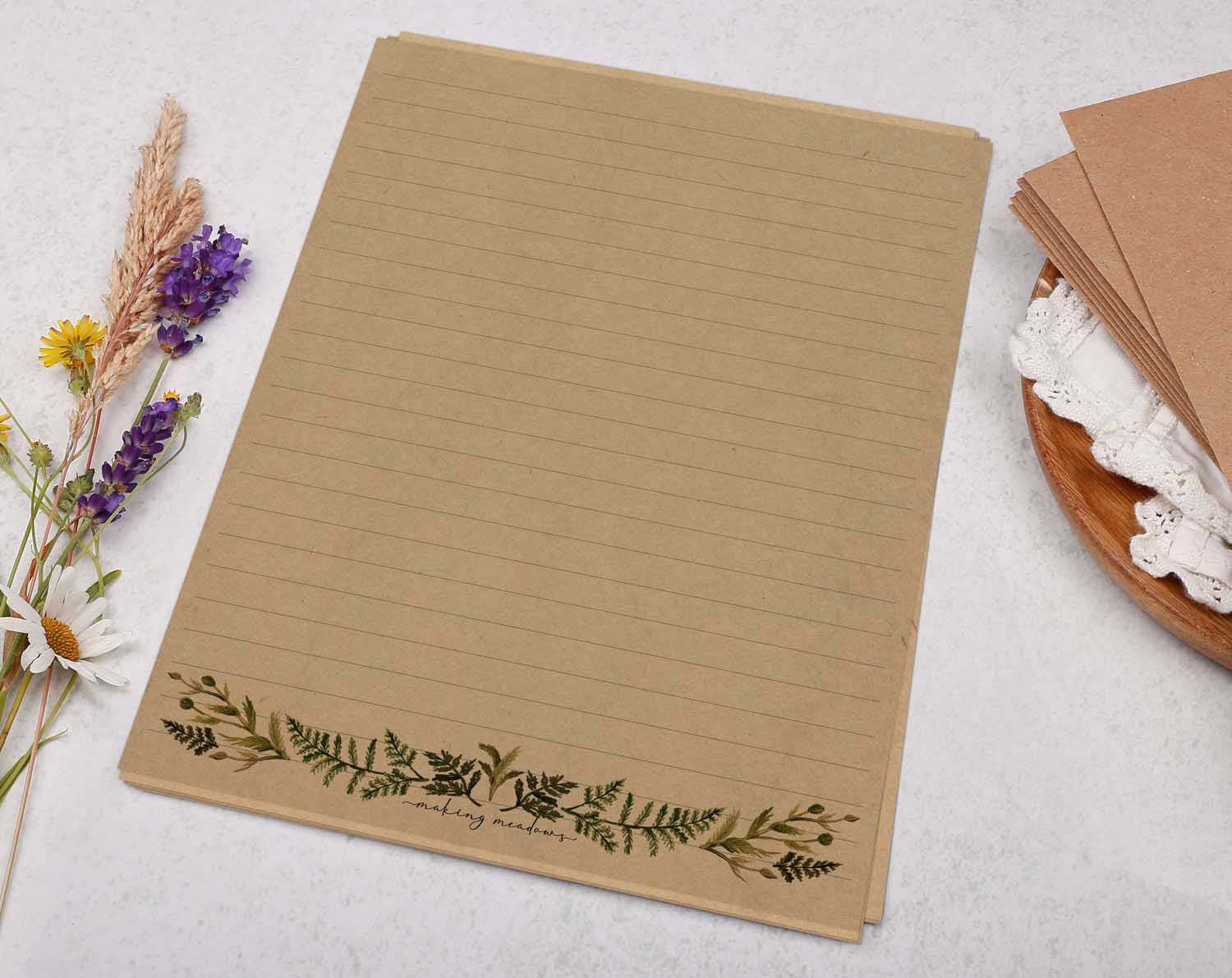 A5 kraft writing paper with botanical edge. Stationery designed by Making Meadows