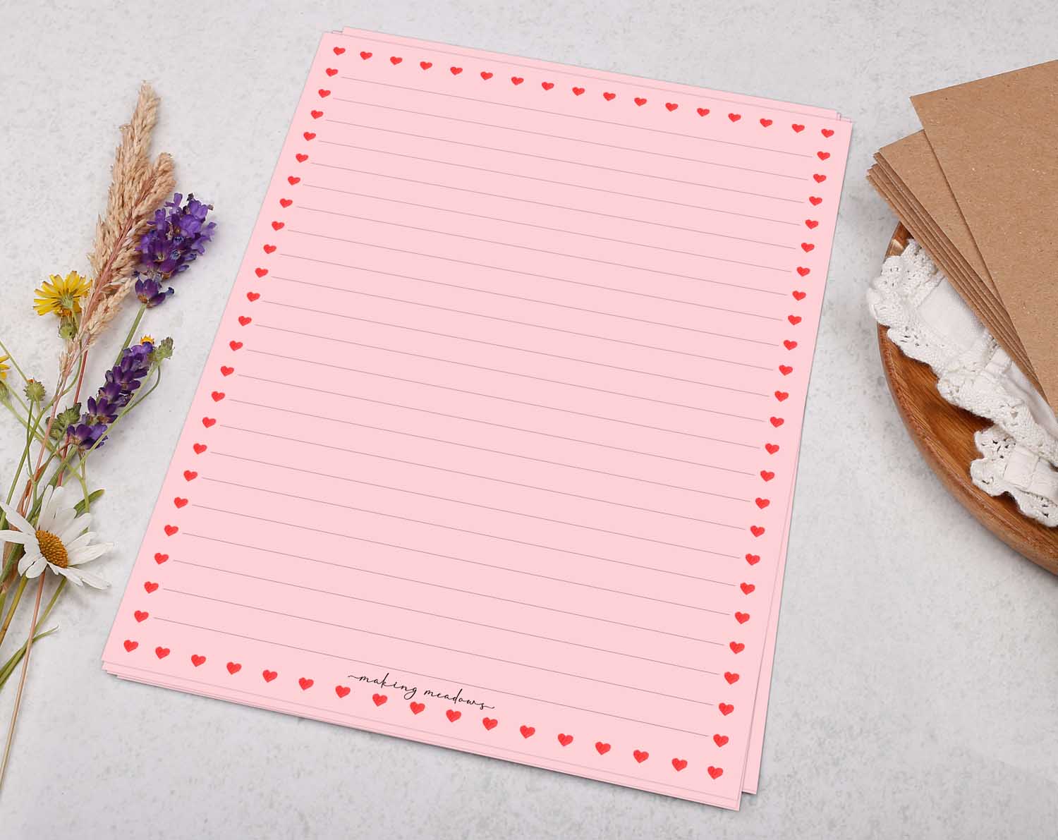 A5 pink writing paper with ditsy hearts. Stationery designed by Making Meadows