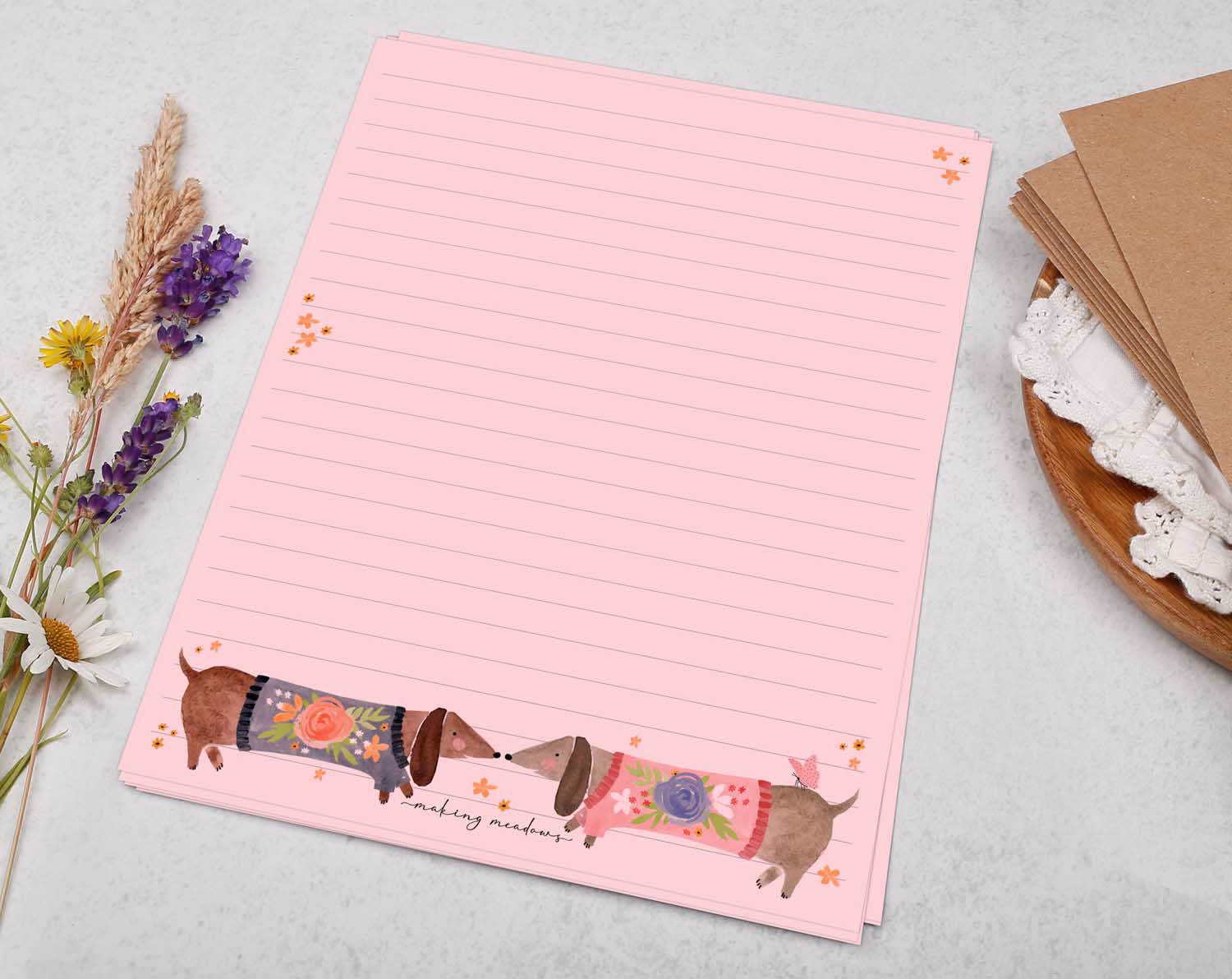 A5 pink writing paper with sausage dogs. Stationery designed by Making Meadows