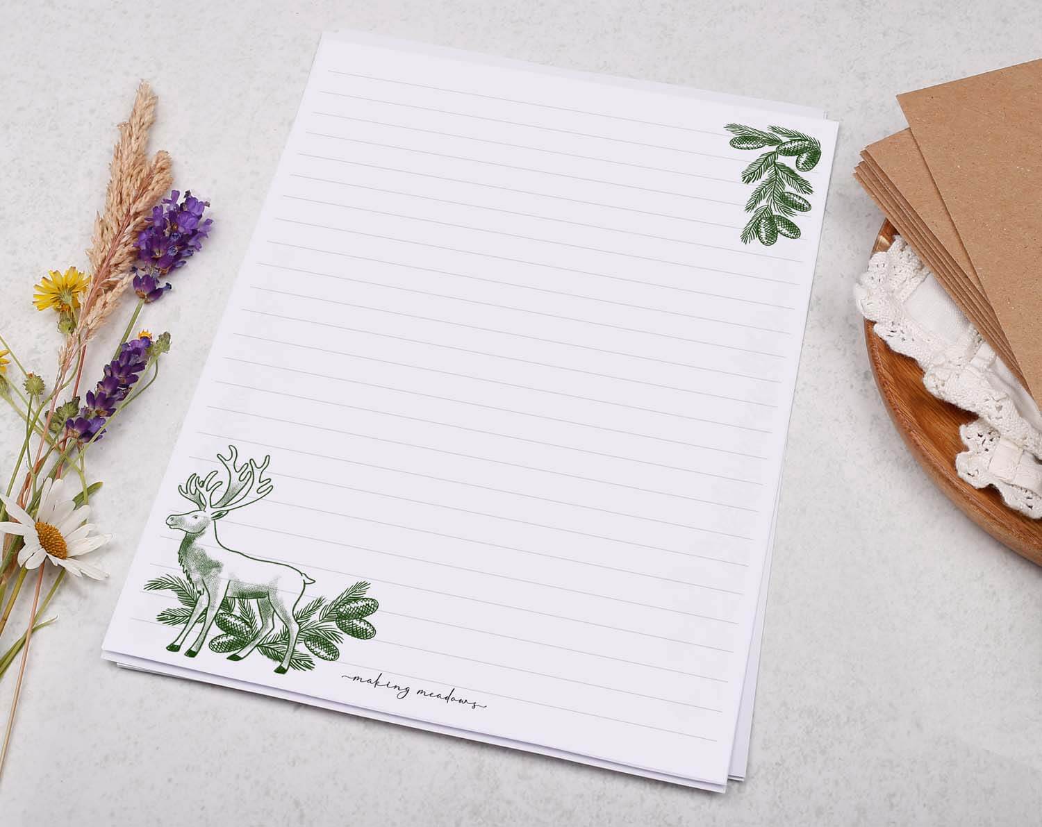 A5 writing paper with Traditional Reindeer featuring a decorative reindeer and greenery in the corners.