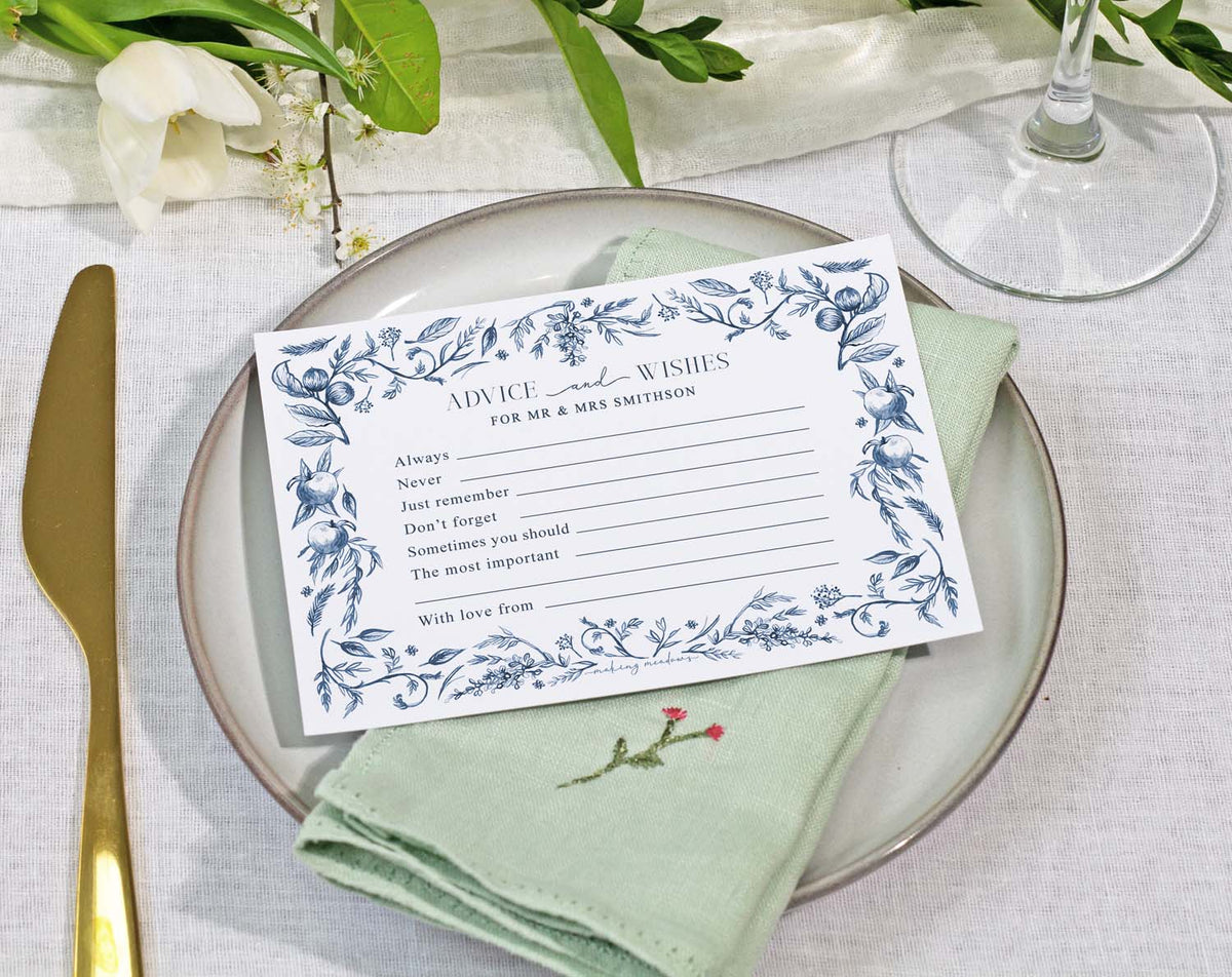 Blue Garden Wedding Advice Cards on a plate with linen, inviting guests to share their wishes and advice.