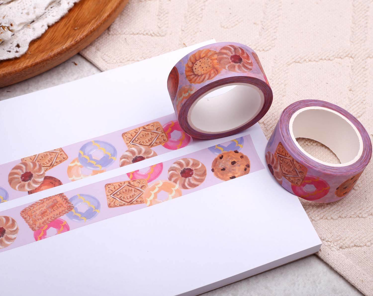 Biscuit Washi Tape rolls featuring colorful biscuit designs on a white background, perfect for crafts and scrapbooking.