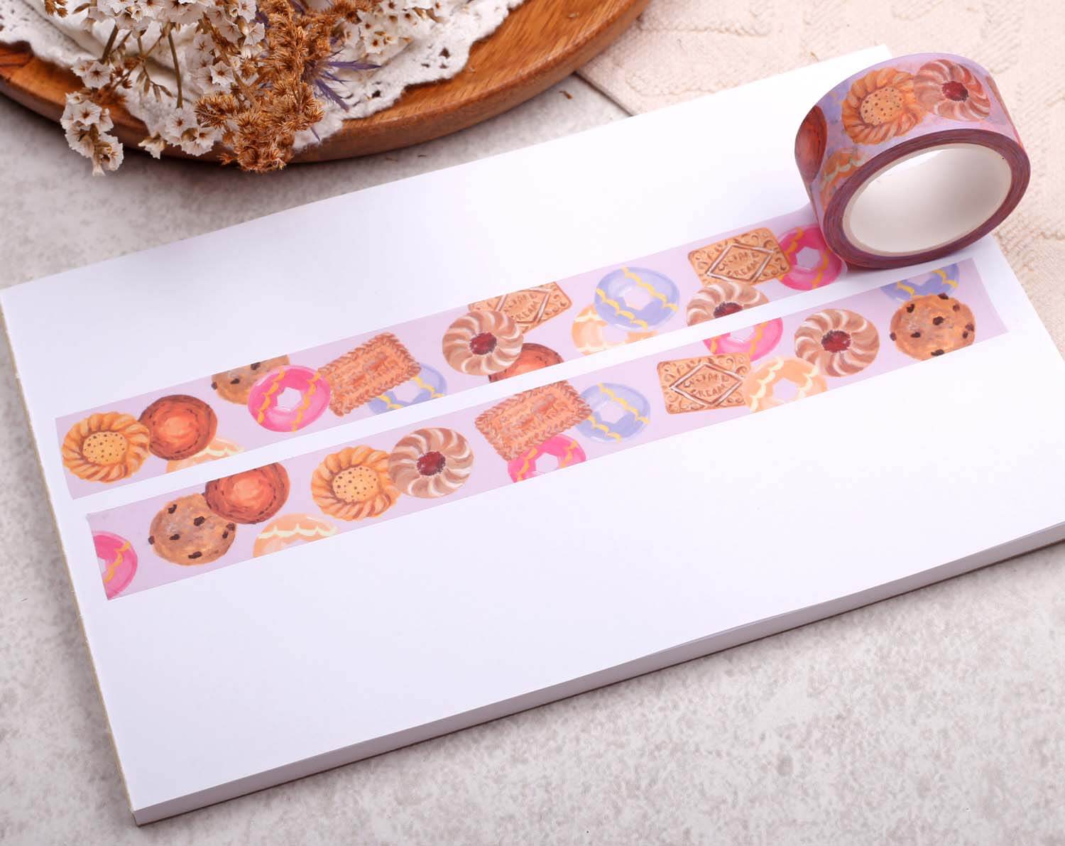 Biscuit Washi Tape showcasing colorful biscuit designs on a white background, perfect for crafts and decorating.
