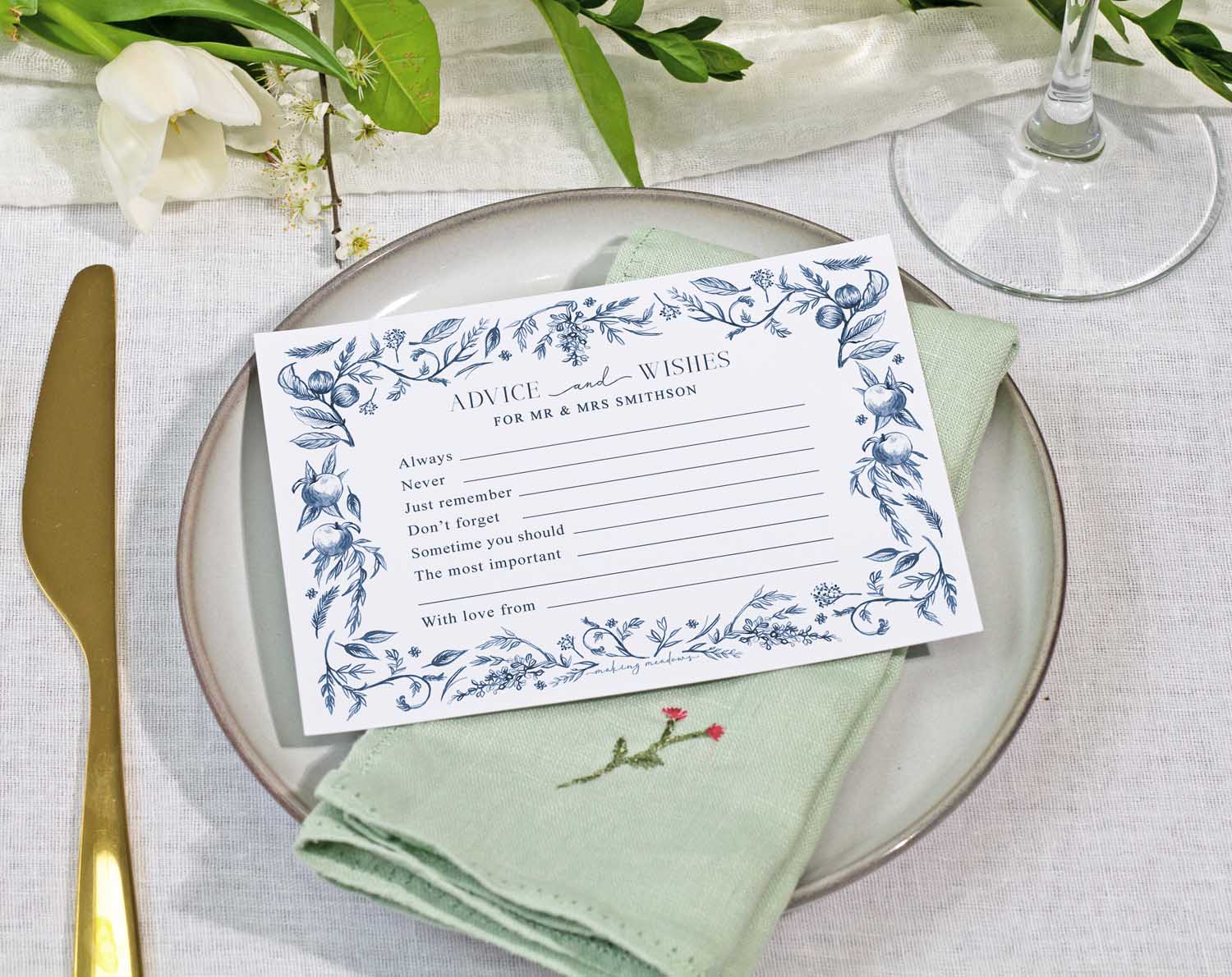 Blue Garden Wedding Advice Cards displayed on a plate with a napkin, inviting guests to share their wishes and advice.