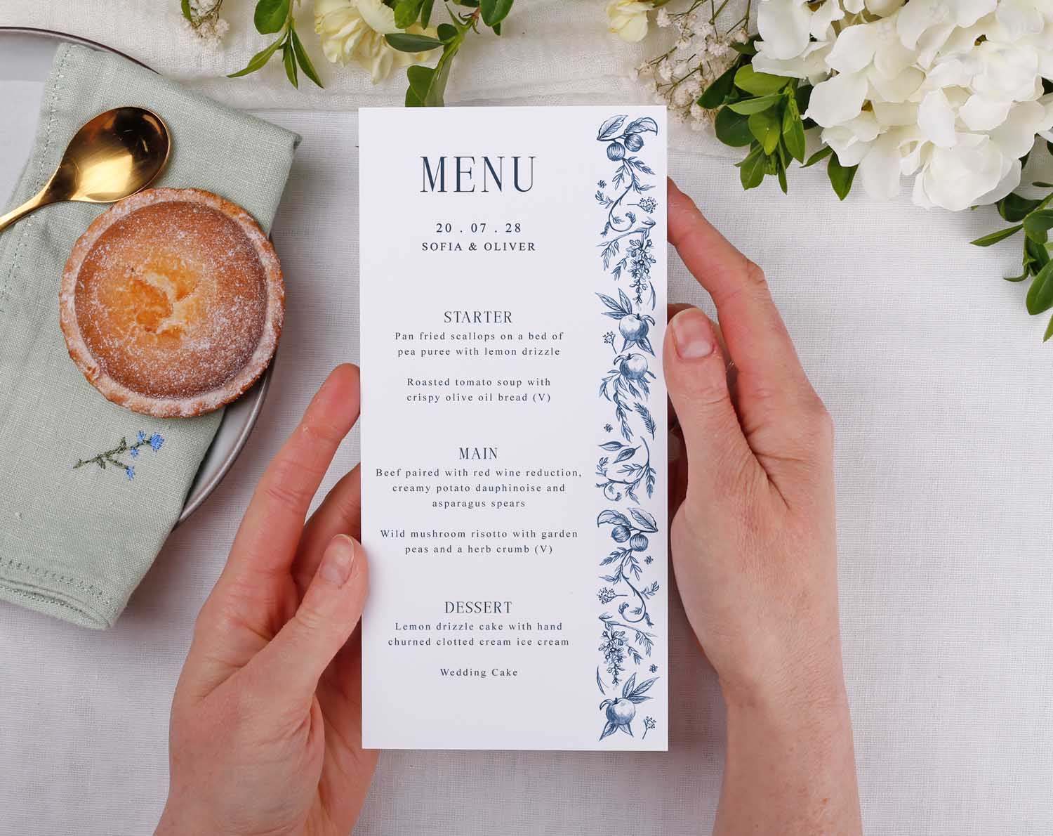 Blue Garden Wedding Menus featuring elegant floral design and detailed menu options for a wedding.